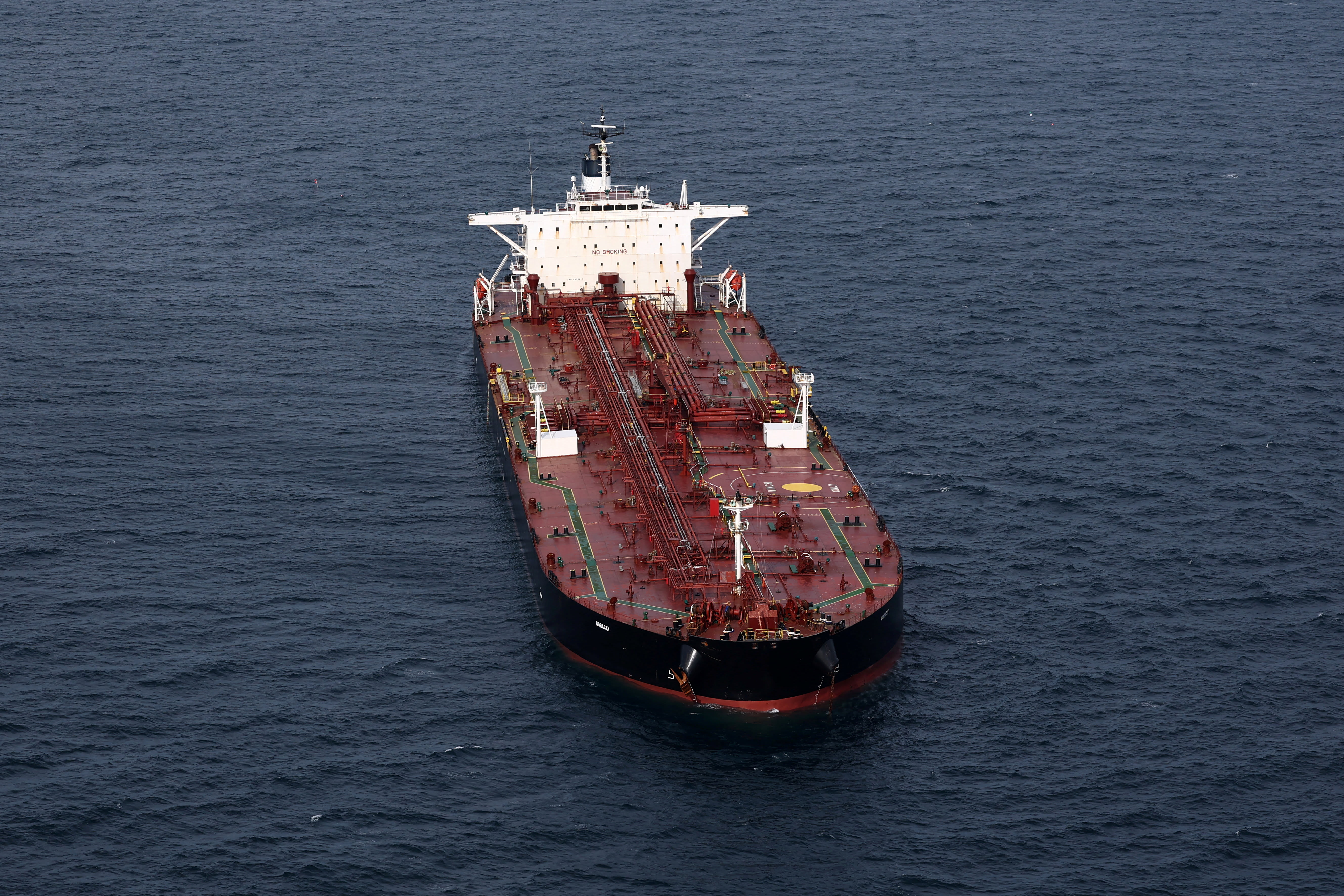 An aerial view shows the oil tanker named Boracay (also called Pushpa), a vessel being investigated by French authorities and suspected of belonging to the so-called "shadow fleet" involved in the Russian oil trade, off the coast of the western France port of Saint-Nazaire, France, October 2, 2025 (photo credit: REUTERS/STEPHANE MAHE)