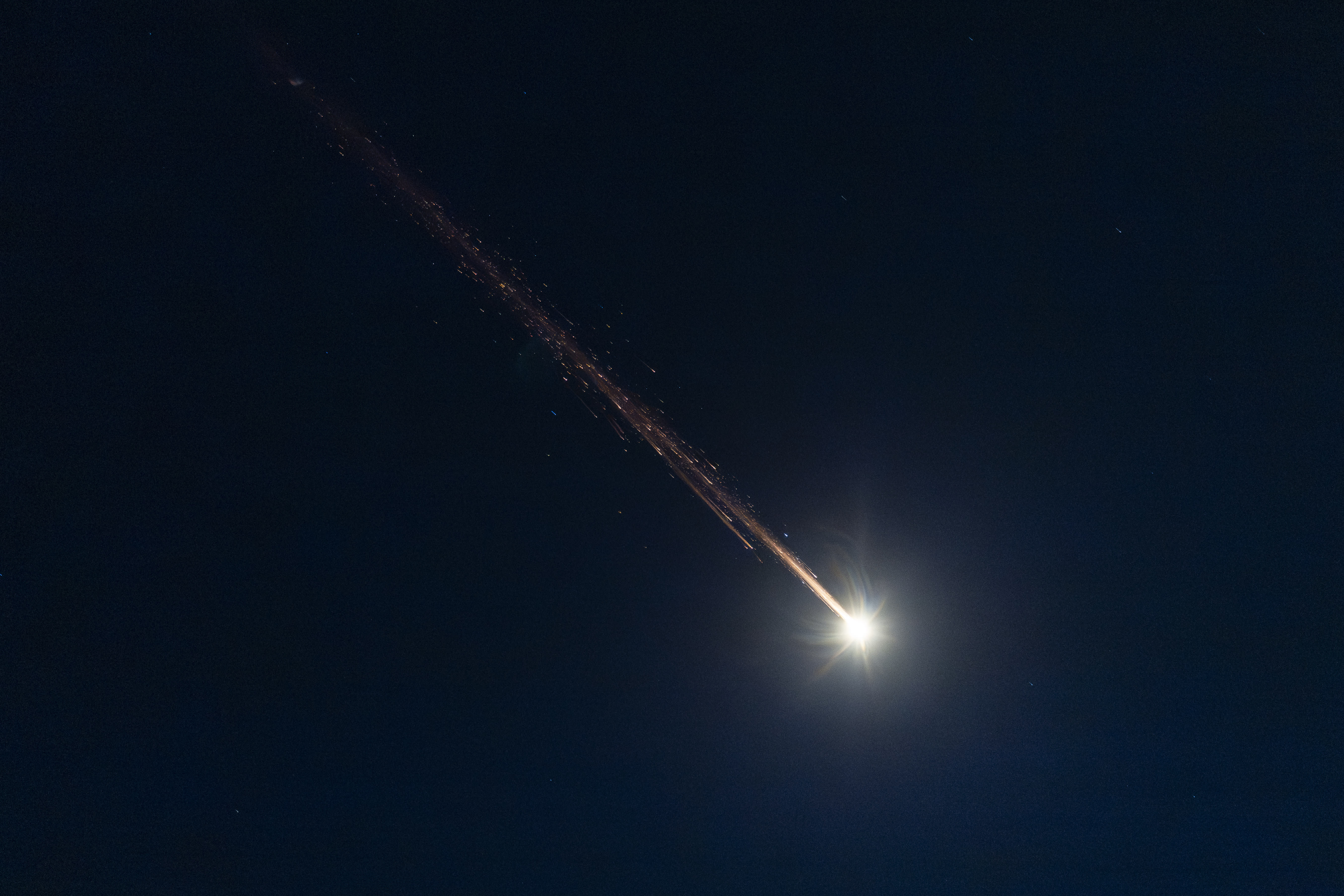 Ballistic missiles launched from Iran, as seen over Jerusalem, during the war with Iran and ongoing missile fire toward Israel, April 7, 2026. (photo credit: YONATAN SINDEL/FLASH90)