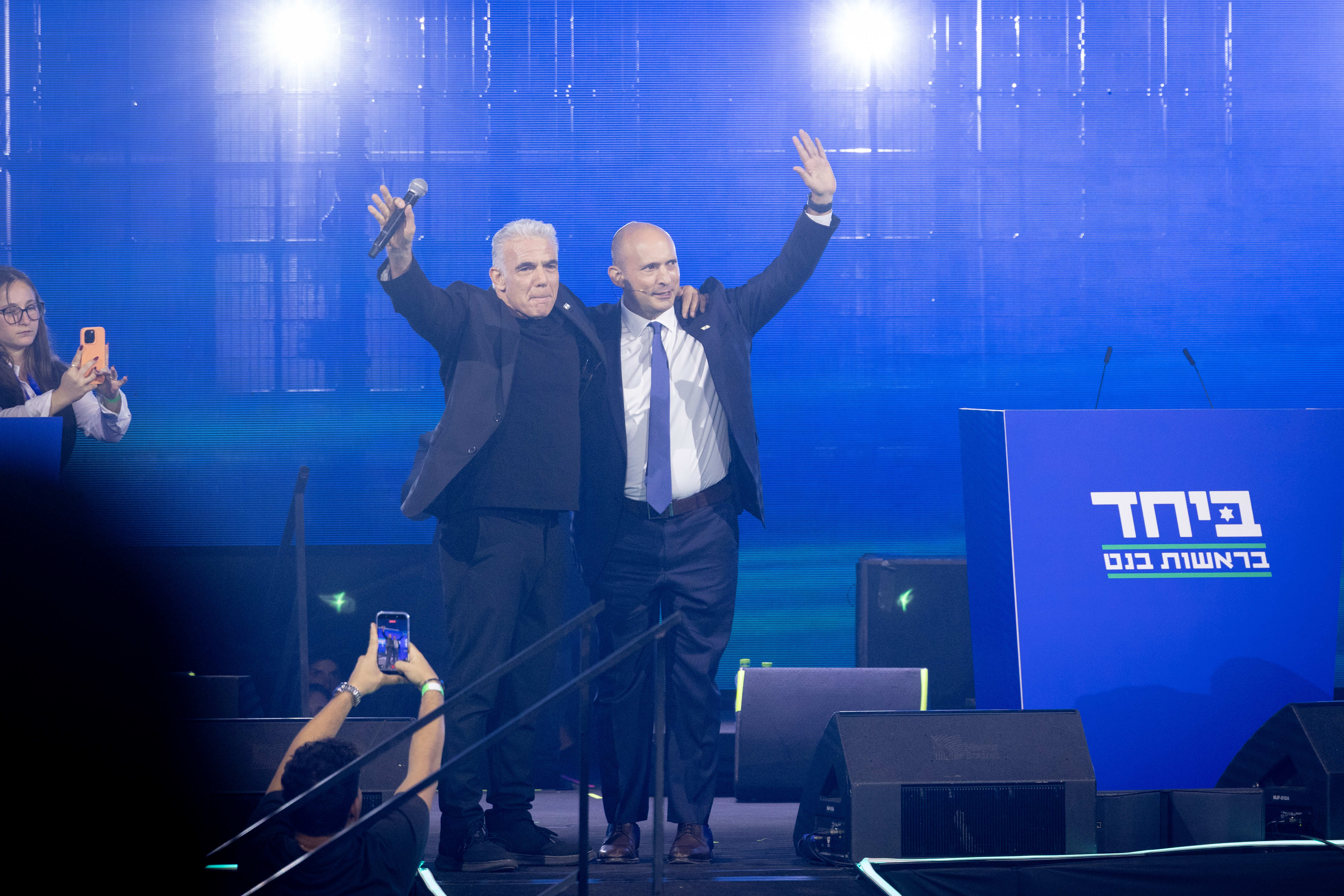 OPPOSITION LEADER Yair Lapid and former Prime Minister Naftali Bennett attend an election event for the joint list “Together” ahead of the upcoming elections, in Tel Aviv, central Israel, May 12, 2026. (photo credit: MIRIAM ALSTER/FLASH90)
