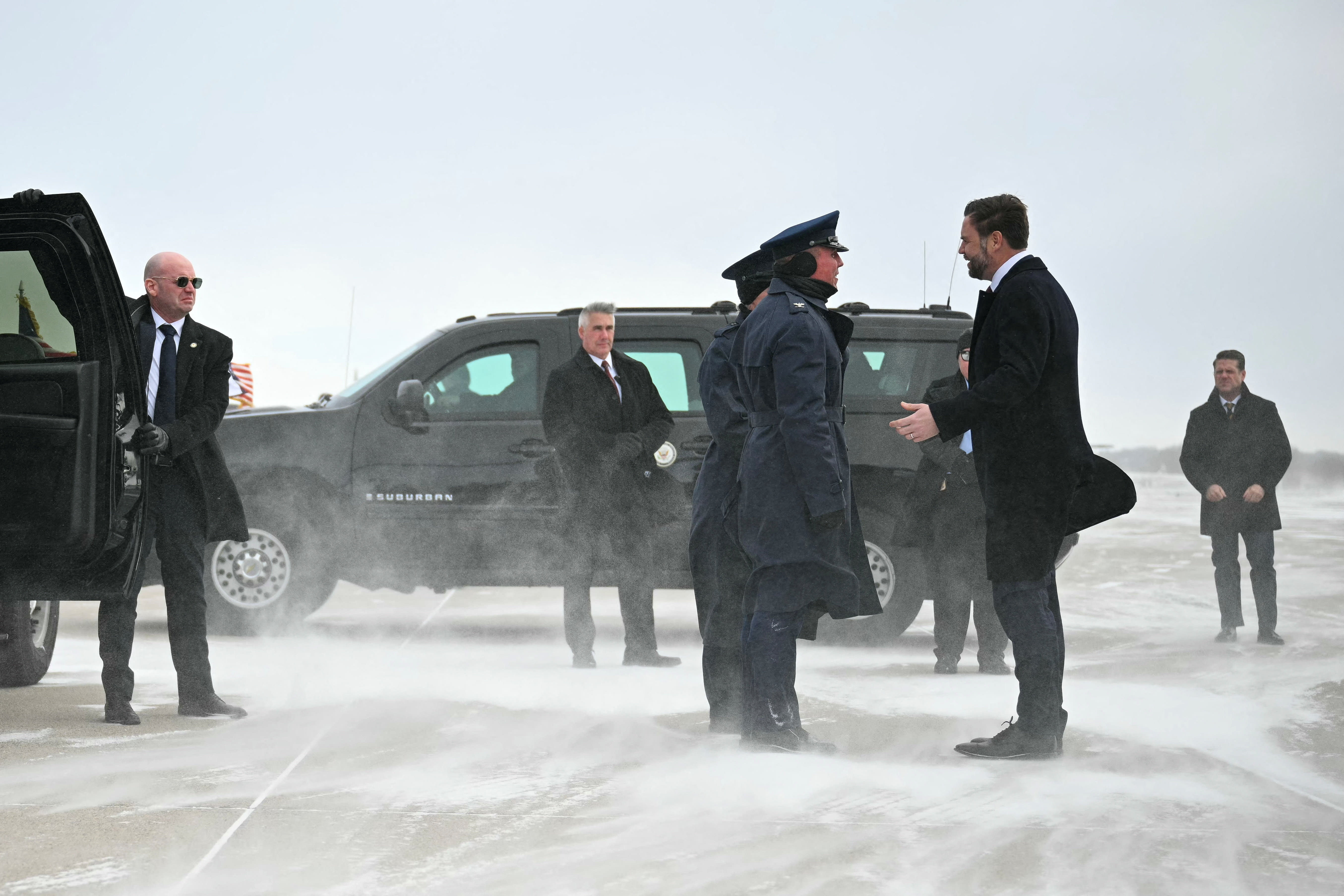 US Vice President JD Vance is greeted upon arrival on Air Force Two at the Minneapolis–Saint Paul International Airport in Saint Paul, Minnesota, US, January 22, 2026. (photo credit: JIM WATSON/POOL VIA REUTERS)