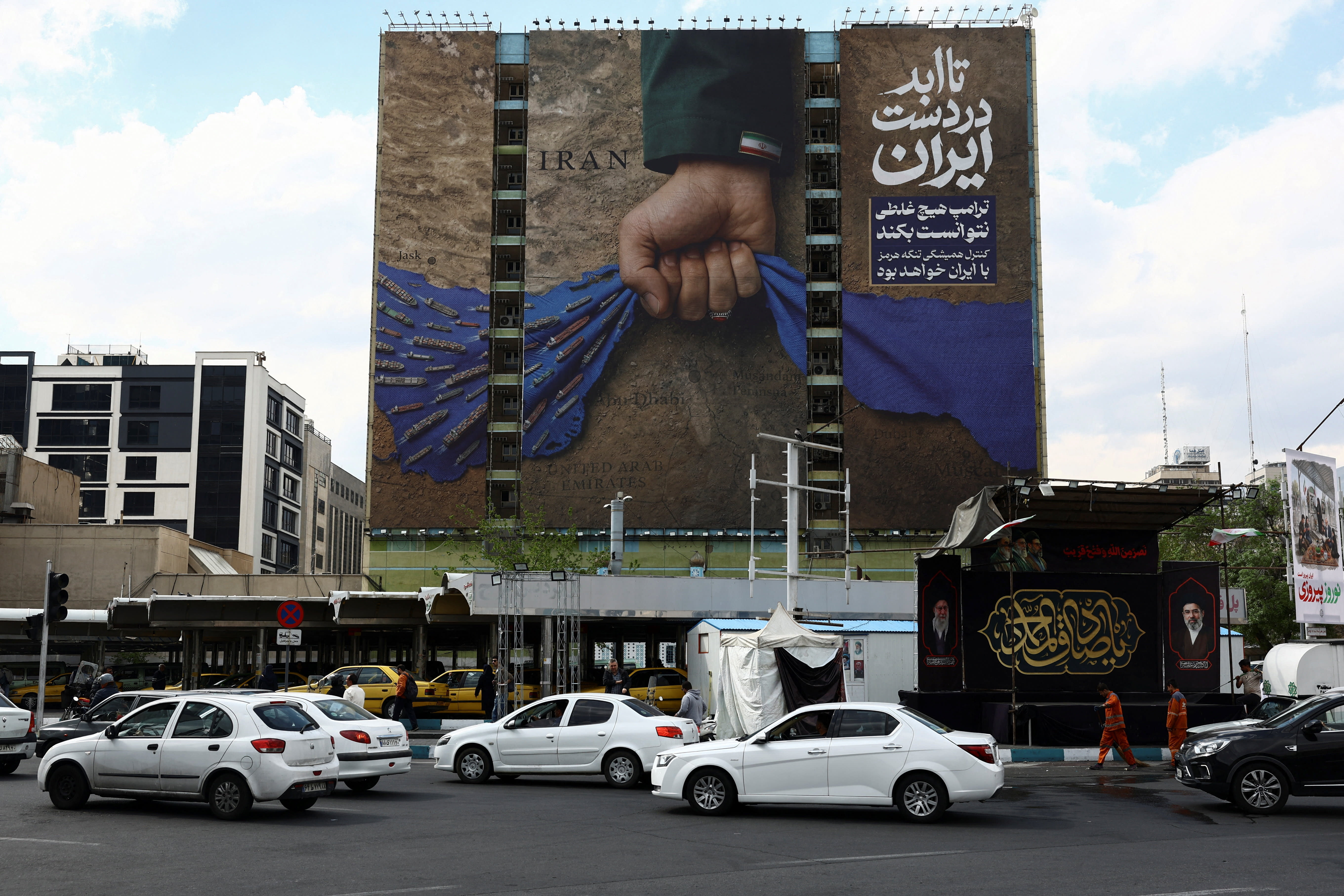 A billboard with a graphic design about the Strait of Hormuz on a building in Tehran, Iran, April 13, 2026 (photo credit: MAJID ASGARIPOUR/WANA (WEST ASIA NEWS AGENCY) VIA REUTERS)