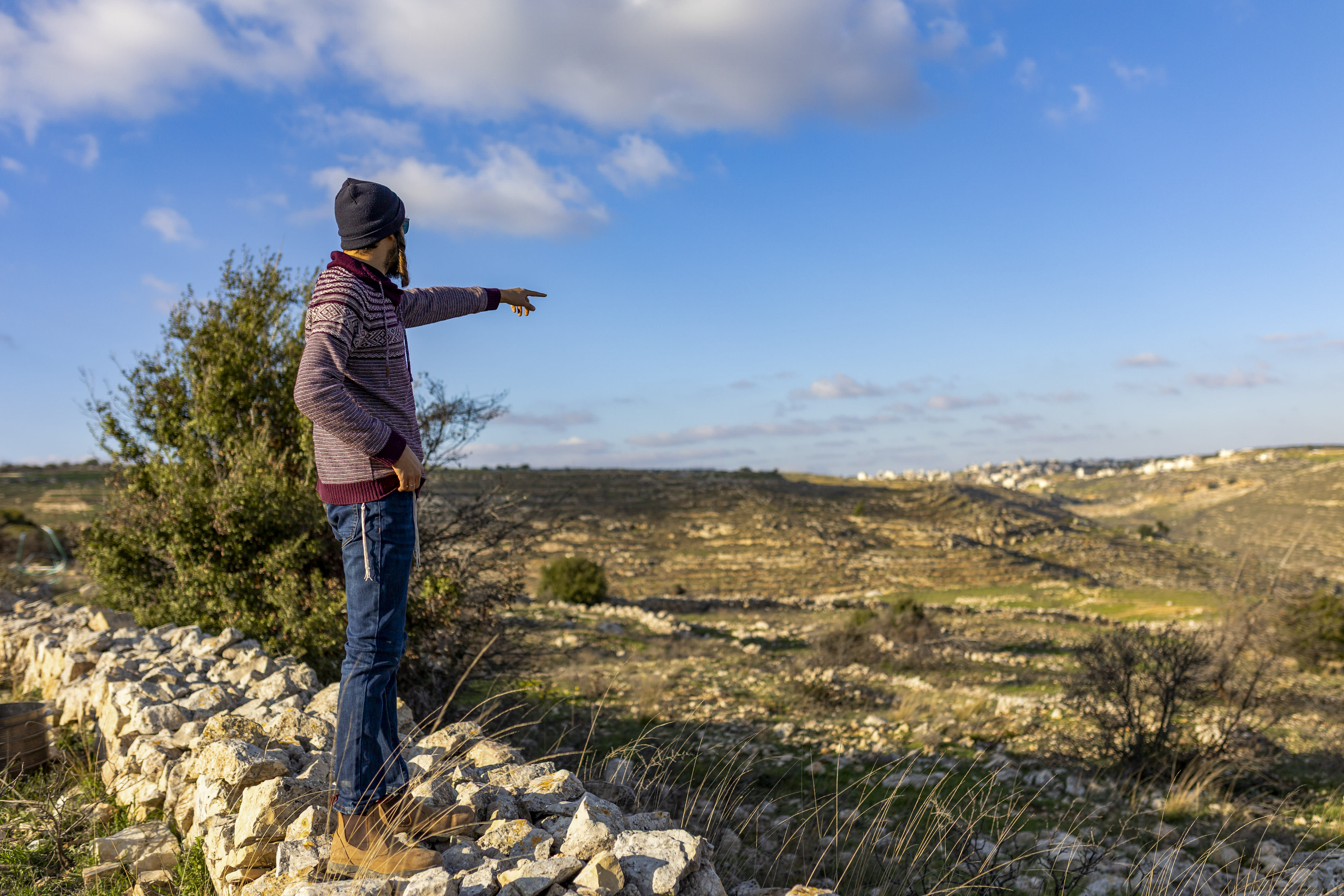 MAN walks in the Jewish outpost of Yahish Zion, near the Jewish settlement of Psagot, in the West Bank. (photo credit: Dor Pazuelo/Flash90)