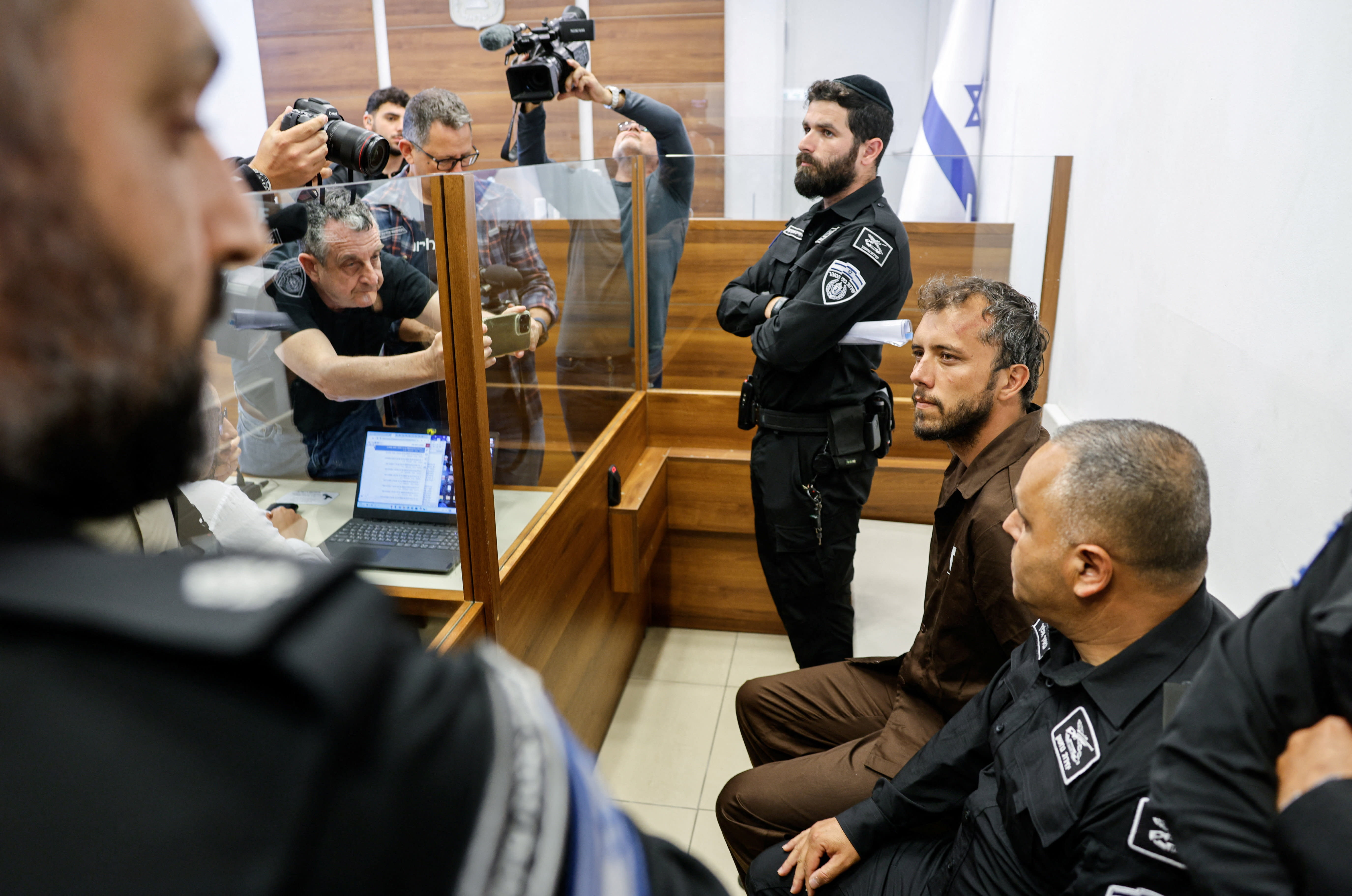 Activist Thiago Avila, a member of the Global Sumud Flotilla detained by Israel, sits at a magistrate