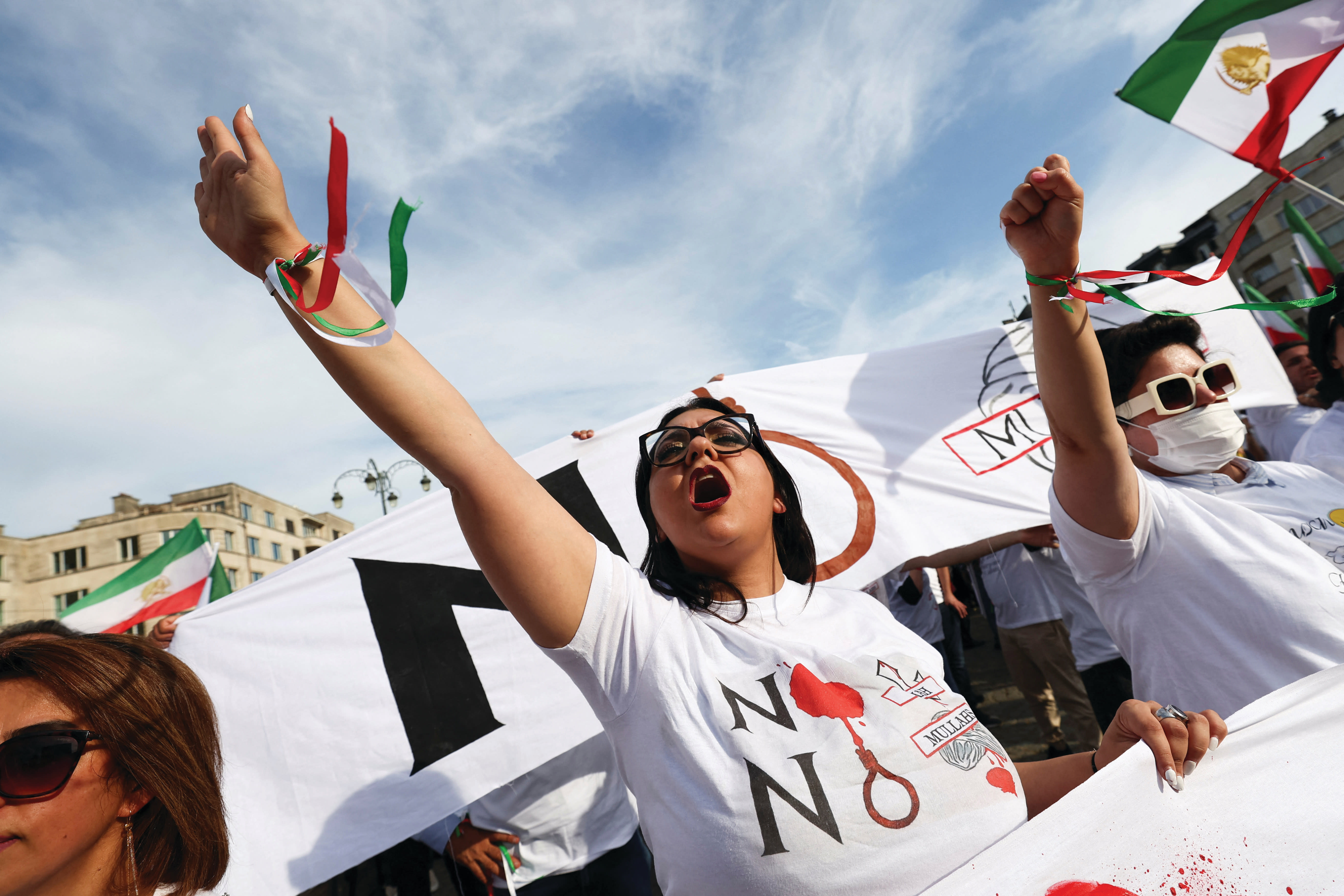  MEMBERS OF the Iranian diaspora in Europe take part in a rally in Brussels last September, marking the first anniversary of the death of Mahsa Amini. (photo credit: YVES HERMAN/REUTERS)