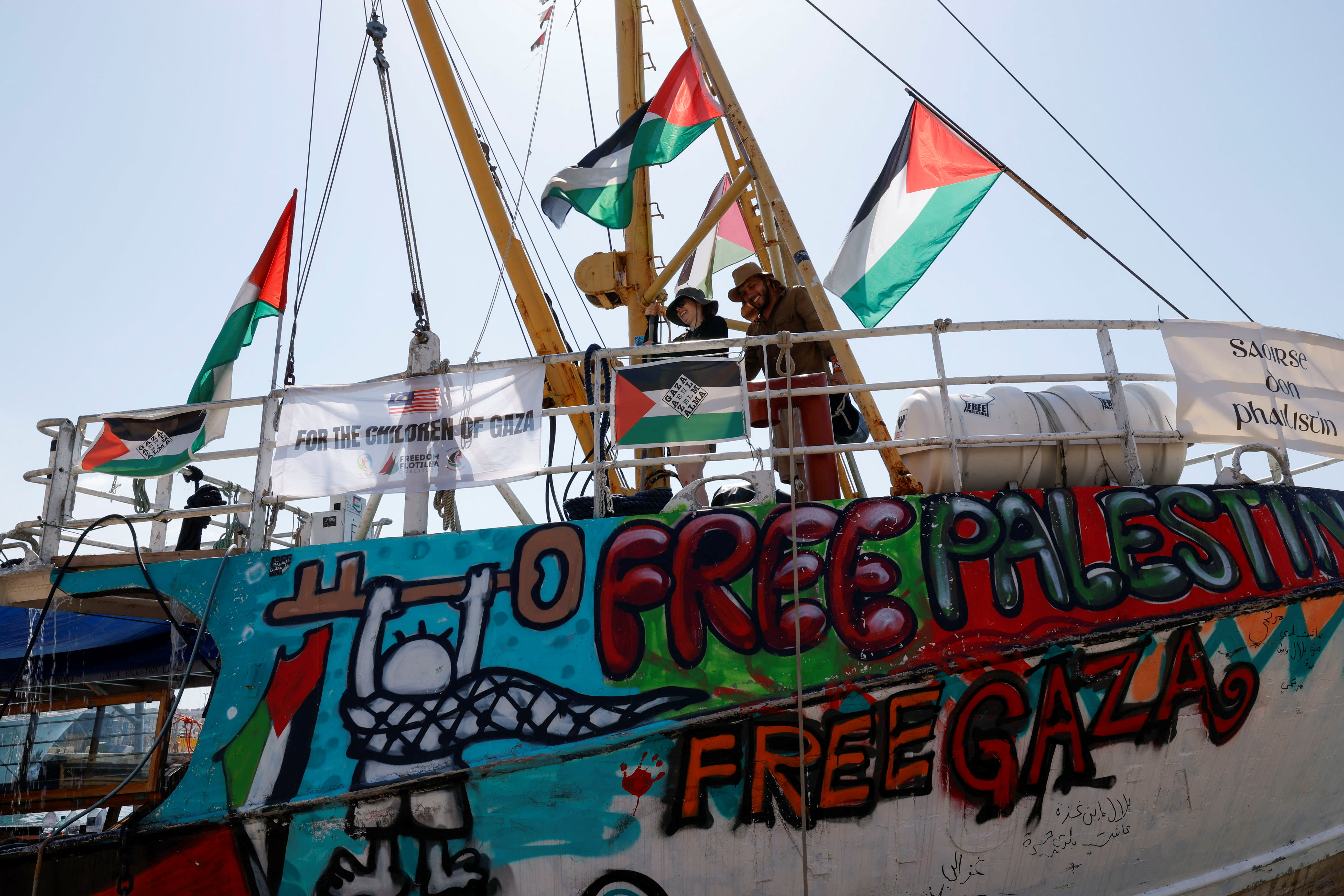  Activists wash the deck of the Freedom Flotilla Coalition ship 
