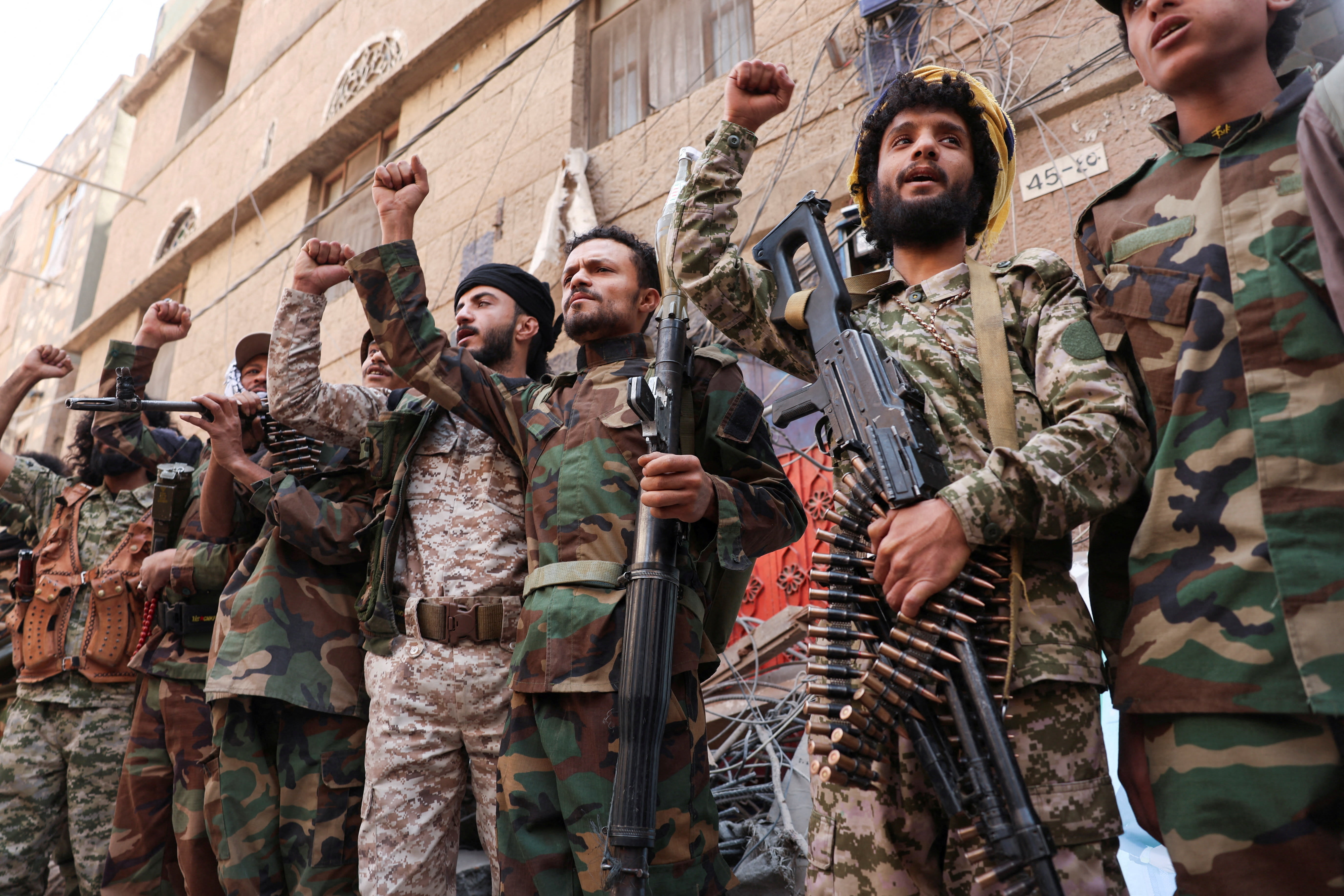 HOUTHI TERRORISTS carry weapons as they stand near the site of Israeli airstrikes in Sanaa, Yemen, in September. Iran has reportedly lost control of the Houthis, the writer notes. (photo credit: KHALED ABDULLAH/REUTERS)
