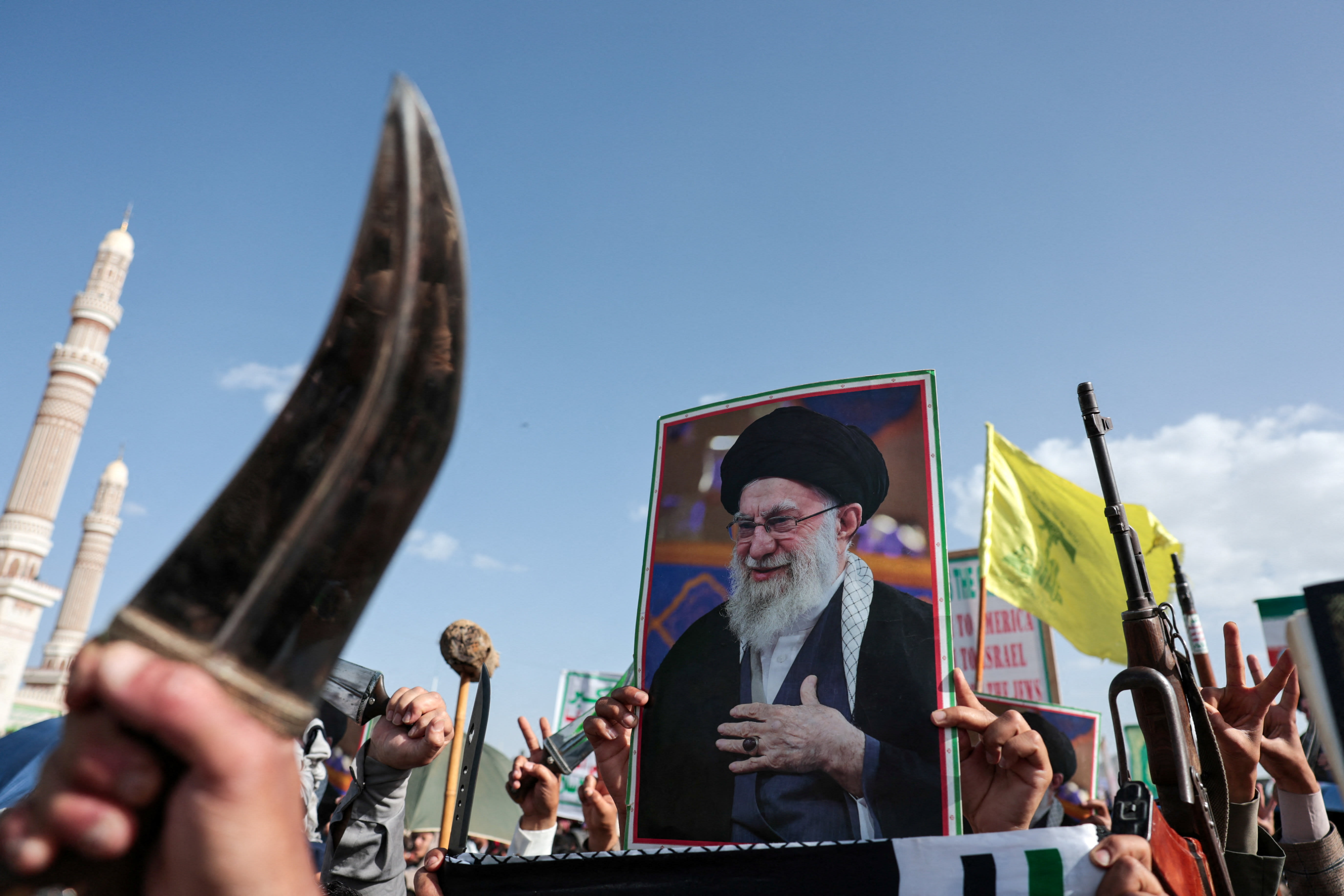 A person holds a poster of the late Supreme Leader of Iran, Ayatollah Ali Khamenei during a demonstration of Houthi supporters in solidarity with Iran, as the U.S.-Israeli conflict with Iran continues, in Sanaa, Yemen, April 3, 2026.  (photo credit: KHALED ABDULLAH/REUTERS)