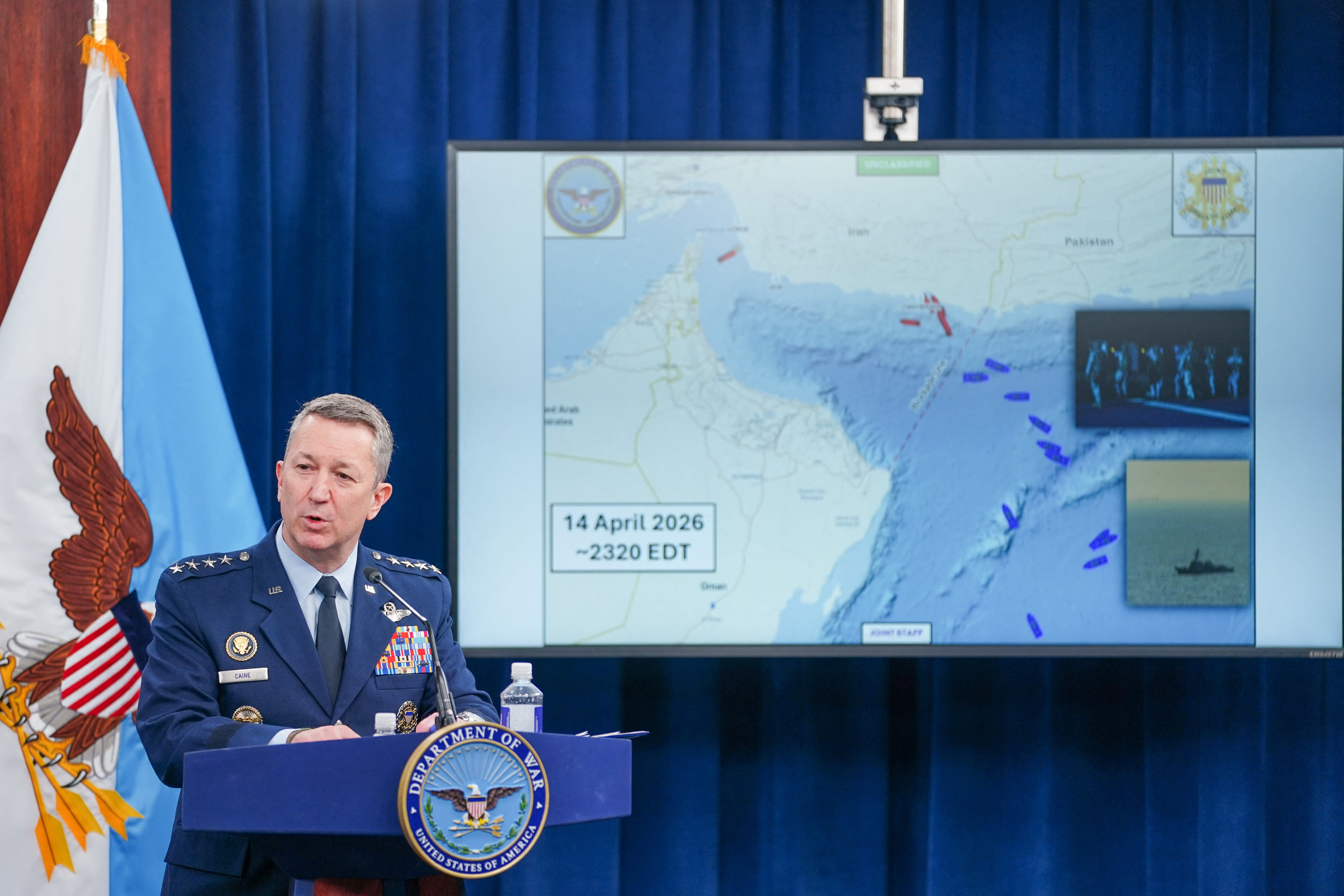 Chairman of the Joint Chiefs of Staff General Dan Caine speaks next to a map showing a blockade line on the Strait of Hormuz, during a briefing on the Iran war at the Pentagon in Washington, DC, US, April 16, 2026.  (photo credit: REUTERS/Nathan Howard)