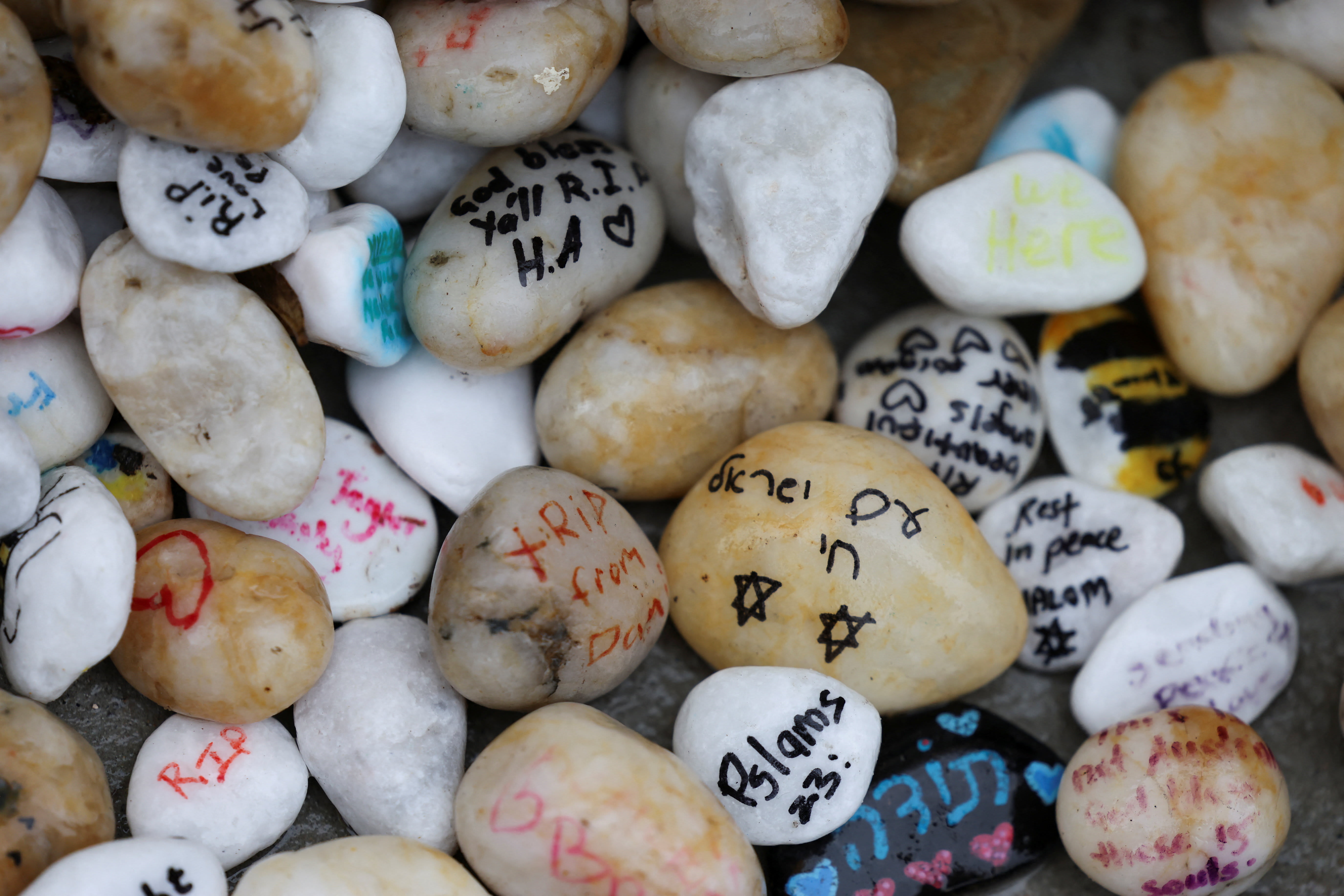 Messages are written on stones laid to honour the families and victims of a deadly mass shooting during a Jewish Hanukkah celebration at Bondi Beach on December 14, 2025, in Sydney, Australia, February 9, 2026.  (photo credit: HOLLIE ADAMS/REUTERS)