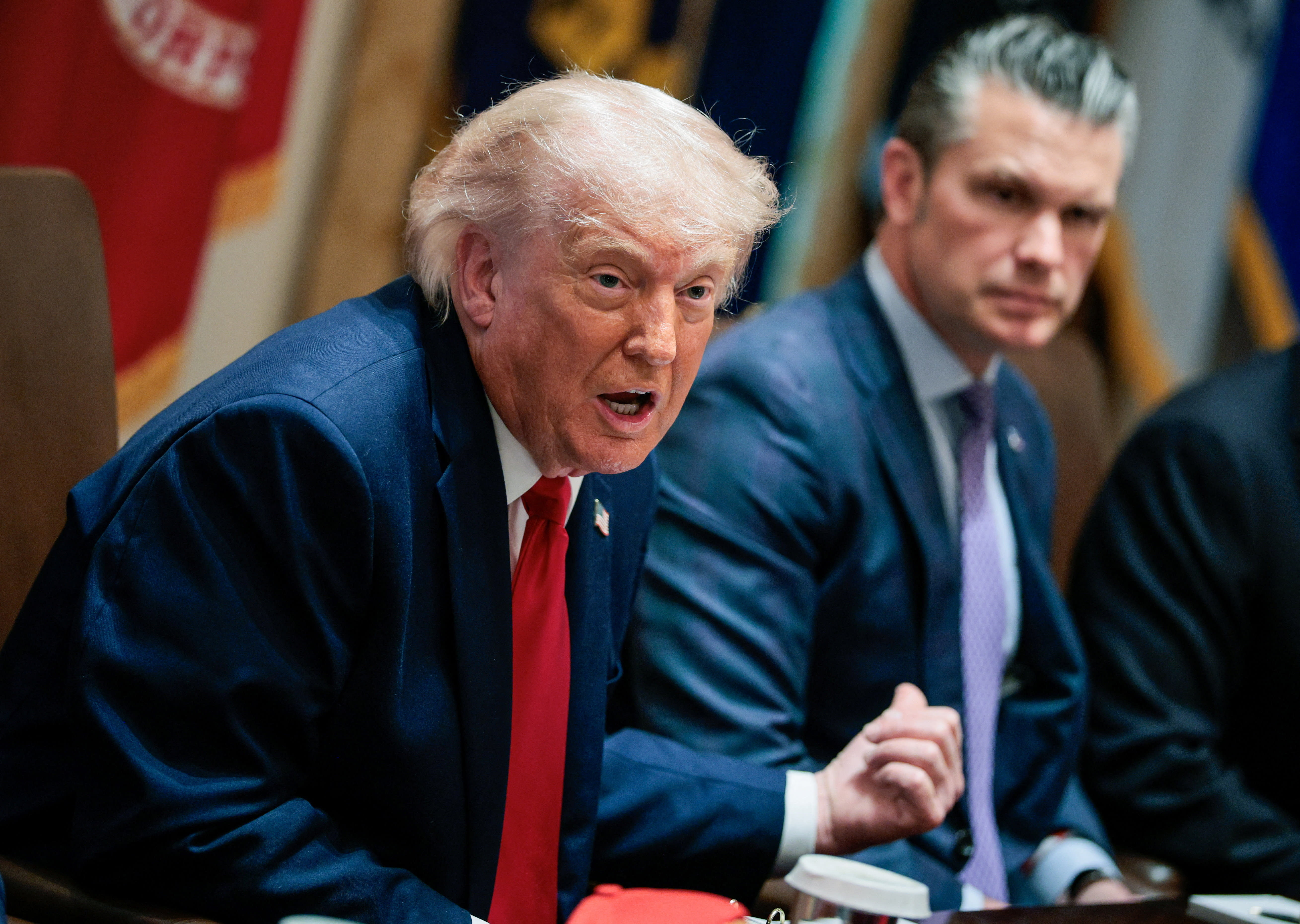 US President Donald Trump speaks next to Defense Secretary Pete Hegseth during a cabinet meeting in the Cabinet Room at the White House, in Washington, DC, US, May 27, 2026. (photo credit:  REUTERS/Evan Vucci)
