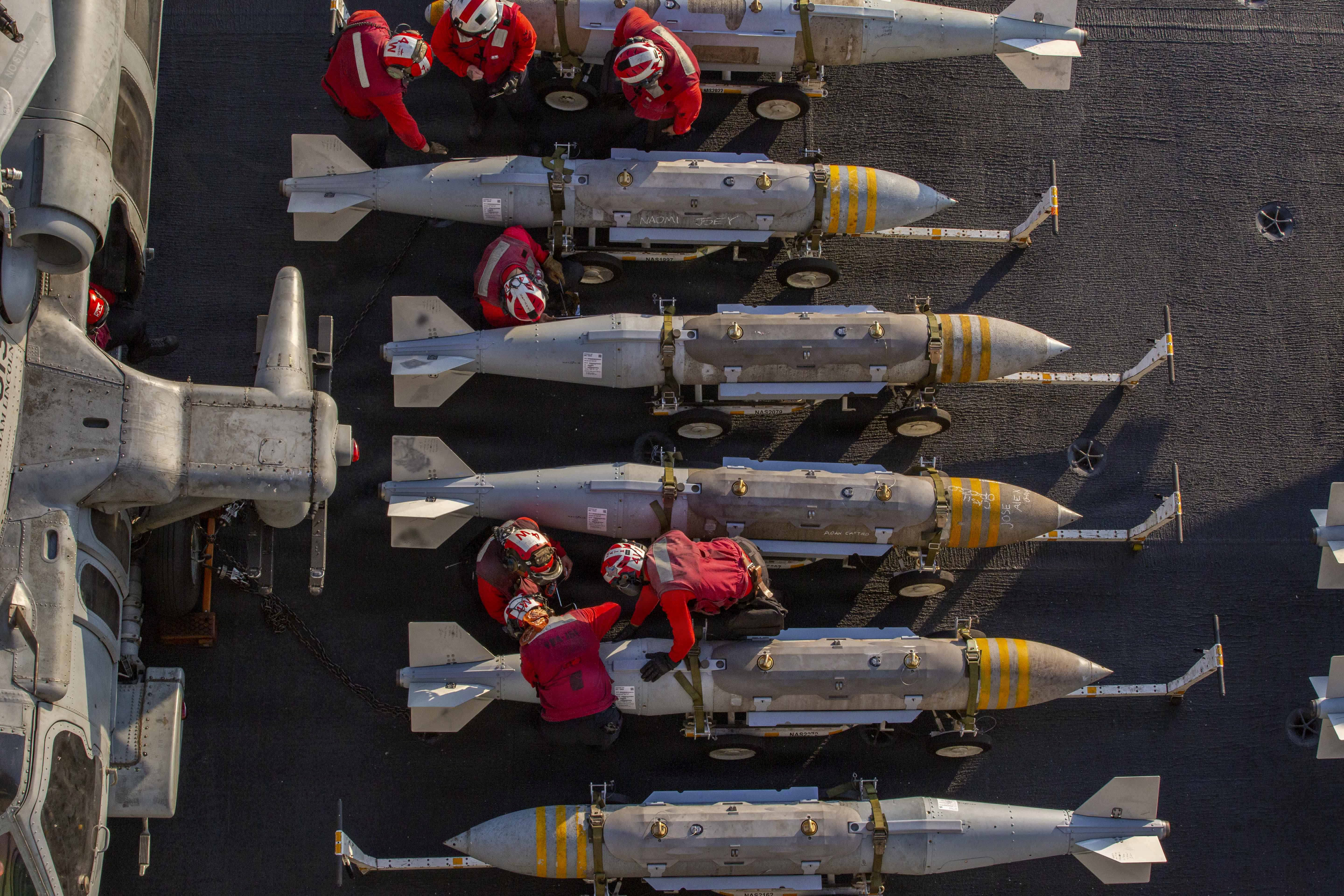 US Sailors prepare to stage ordnance on the flight deck of Nimitz-class aircraft carrier USS Abraham Lincoln (CVN 72) in support of Operation Epic Fury, Feb. 28, 2026. (photo credit: US NAVY)