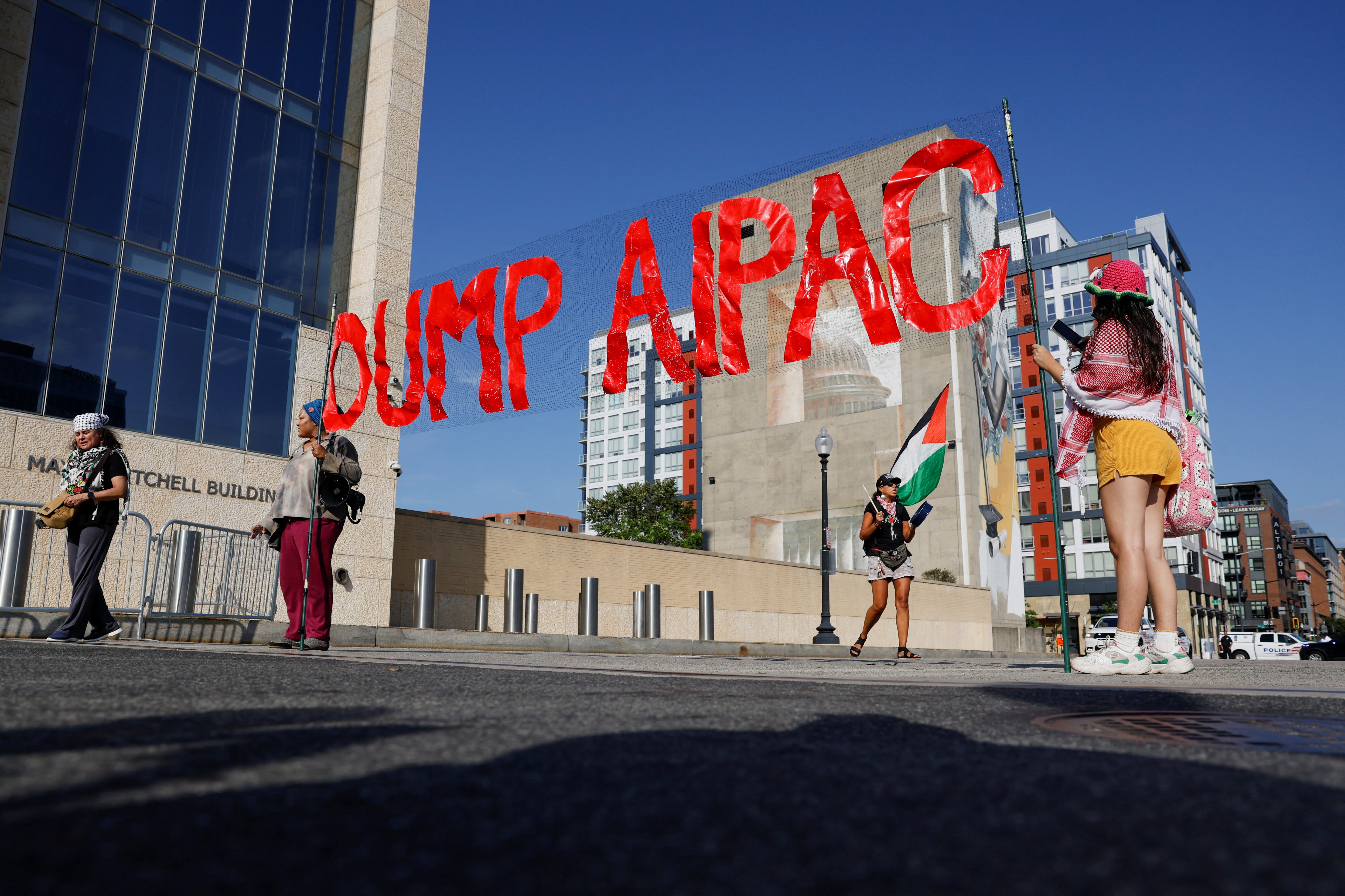 A BANNER that reads "Dump AIPAC" is displayed by demonstrators as they take part in a protest against the US backing of the Israeli military operation in Gaza, outside the Washington office of the American Israel Public Affairs Committee (AIPAC) in Washington, DC, US, September 22, 2025. (photo credit: REUTERS/DANIEL BECERRIL) A BANNER that reads "Dump AIPAC" is displayed by demonstrators as they take part in a protest against the US backing of the Israeli military operation in Gaza, outside the Washington office of the American Israel Public Affairs Committee (AIPAC) in Washington, DC, US, September 22, 2025. (photo credit: REUTERS/DANIEL BECERRIL)