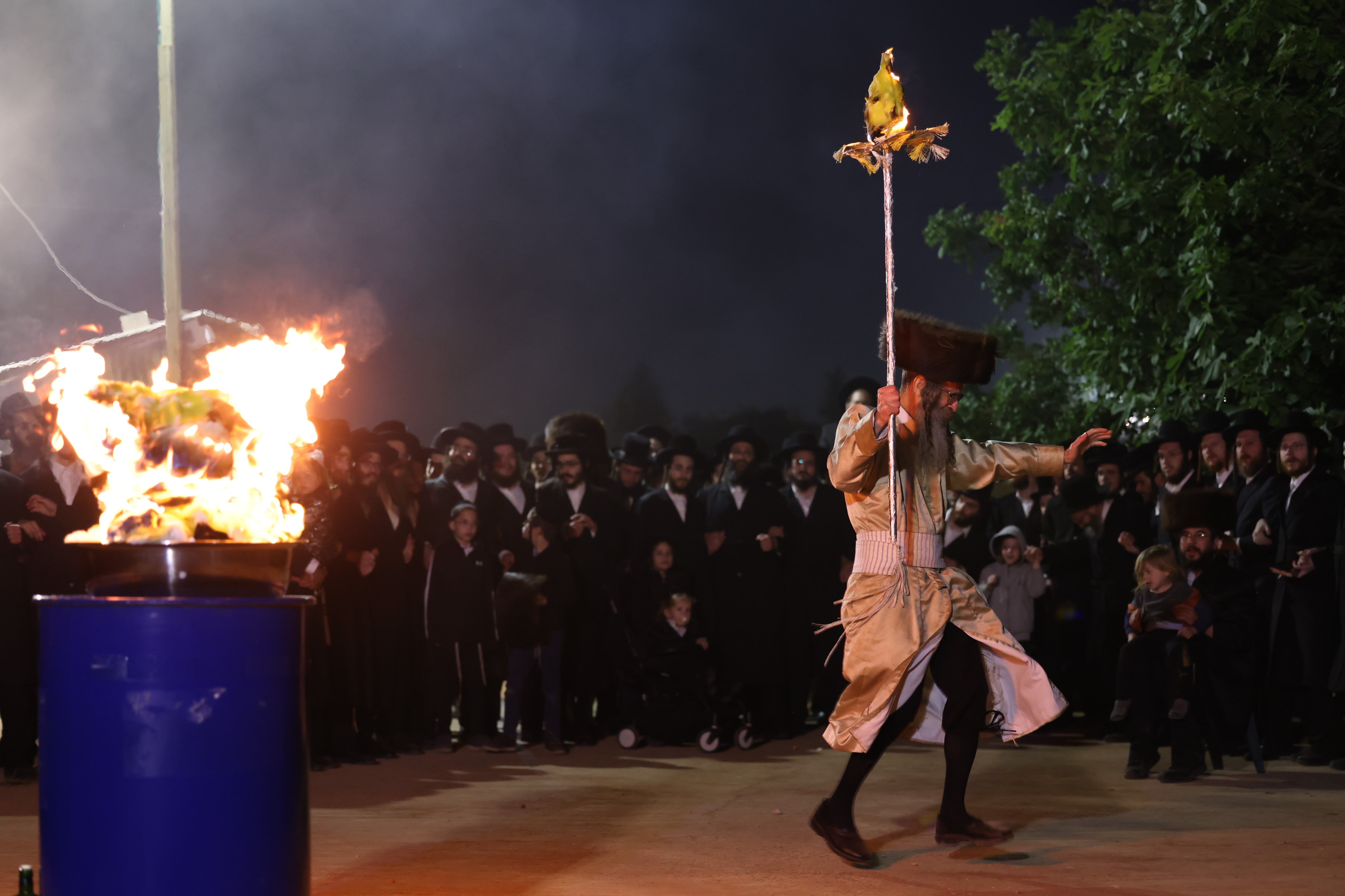 Rabbi Elimelech Biderman with his followers celebrate the jewish holiday of Lag Ba