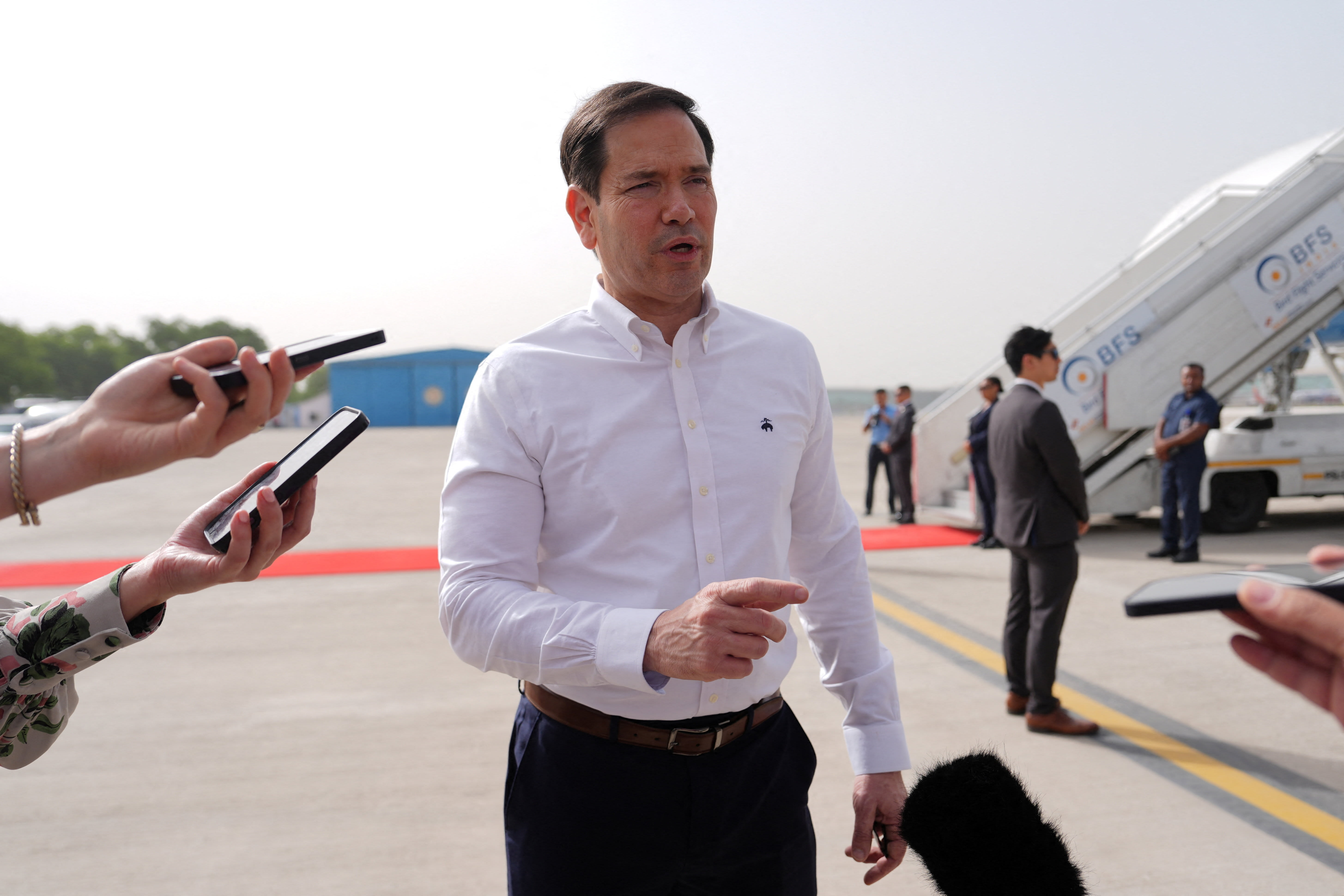 US Secretary of State Marco Rubio speaks to the journalists before boarding his plane at Indira Gandhi International Airport in New Delhi, India, Monday, May 25, 2026. (photo credit: Julia Demaree Nikhinson/Pool via REUTERS)
