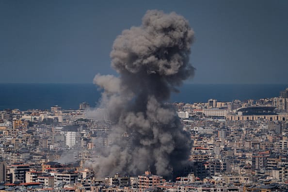 Smoke rises from a building hit in a bombing on March 11, 2026 in Beirut, Lebanon. I (photo credit: Adri Salido/Getty Images)