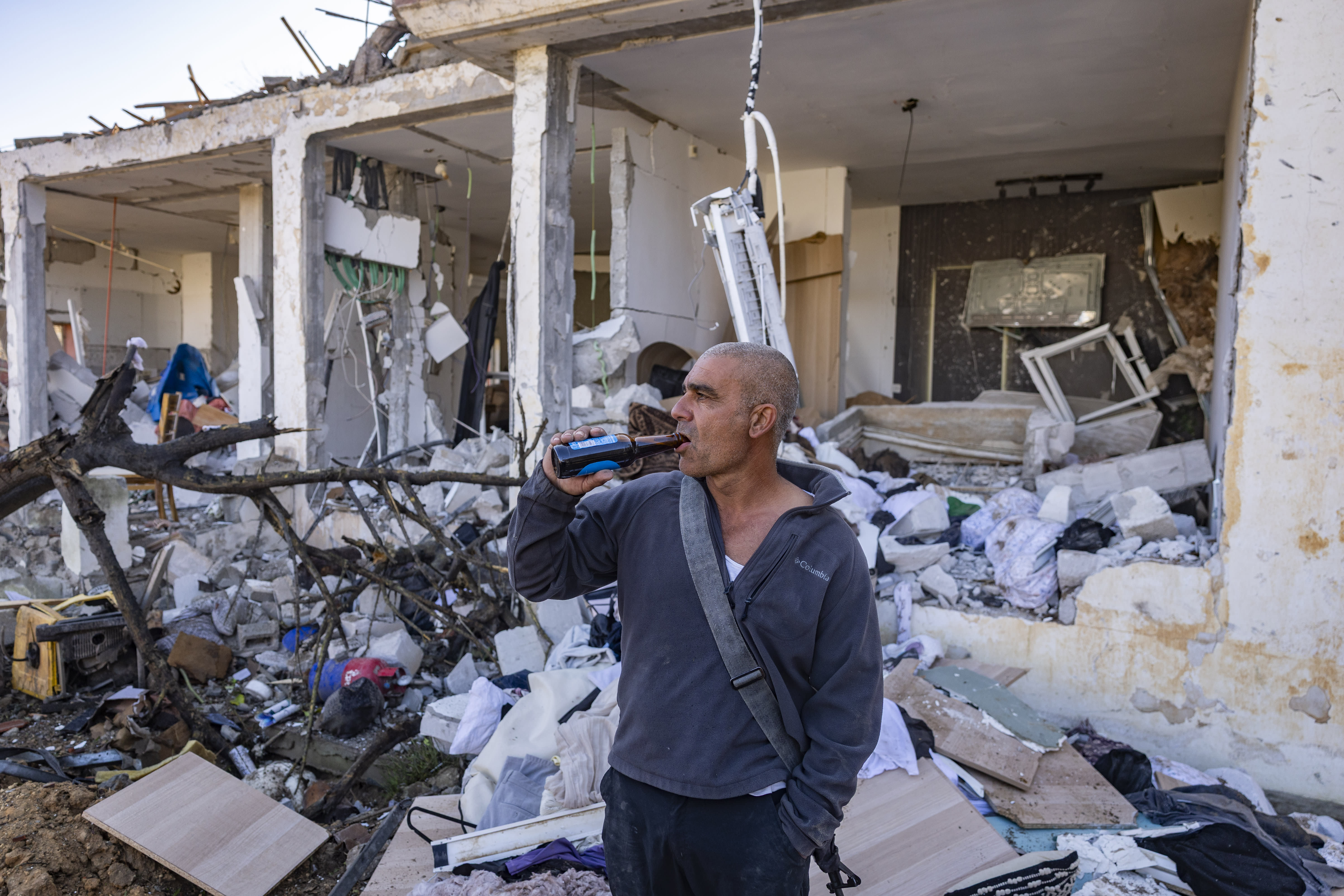 The scene where a missile fired from Iran toward Israel caused damage to residential buildings in the southern Israeli city of Dimona, March 22, 2026. (photo credit: CHAIM GOLDBERG/FLASH90)