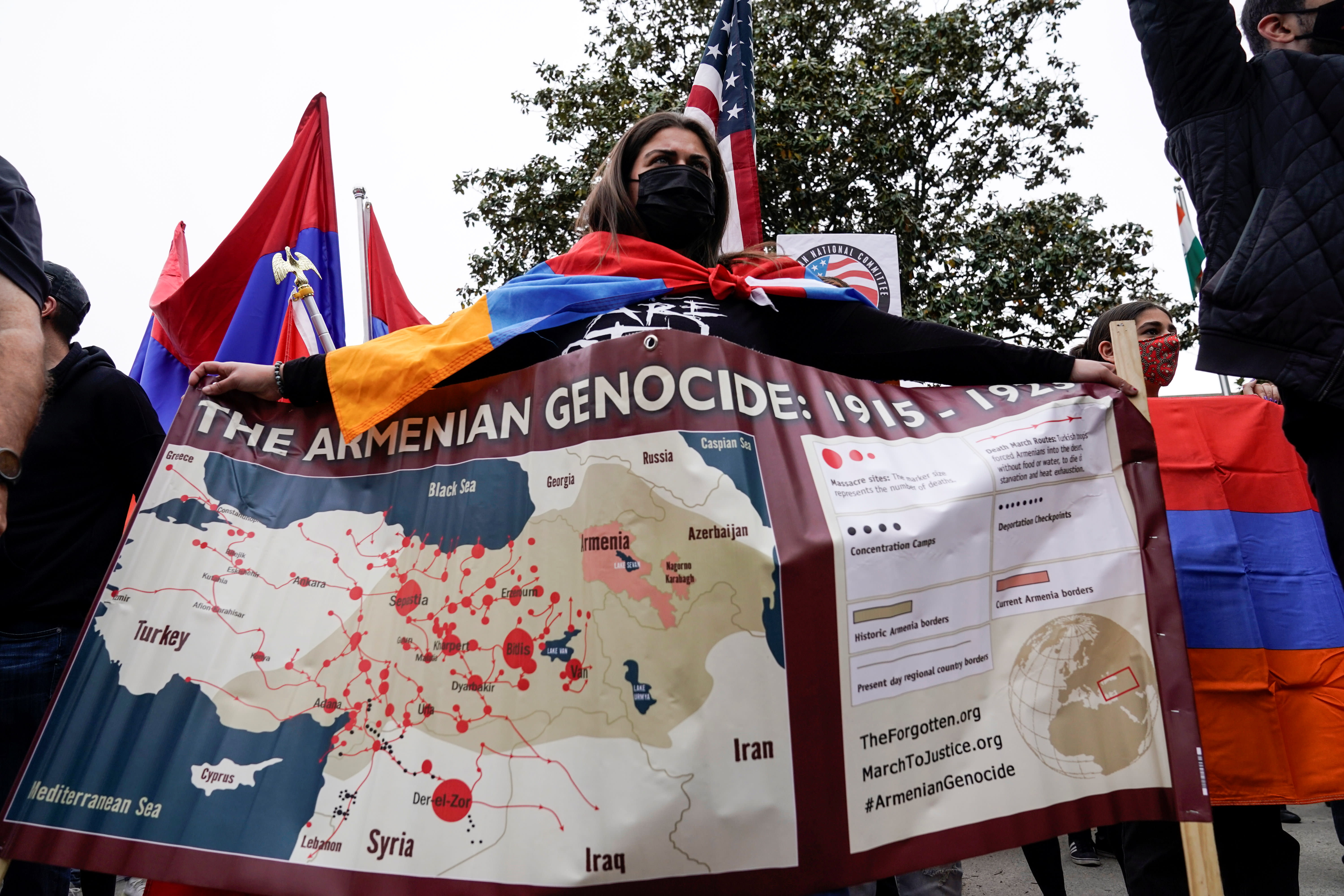  Members of the Armenian diaspora rally in front of the Turkish Embassy after U.S. President Joe Biden recognized that the 1915 massacres of Armenians in the Ottoman Empire constituted genocide in Washington, U.S., April 24, 2021.  (photo credit:  REUTERS/Joshua Roberts)
