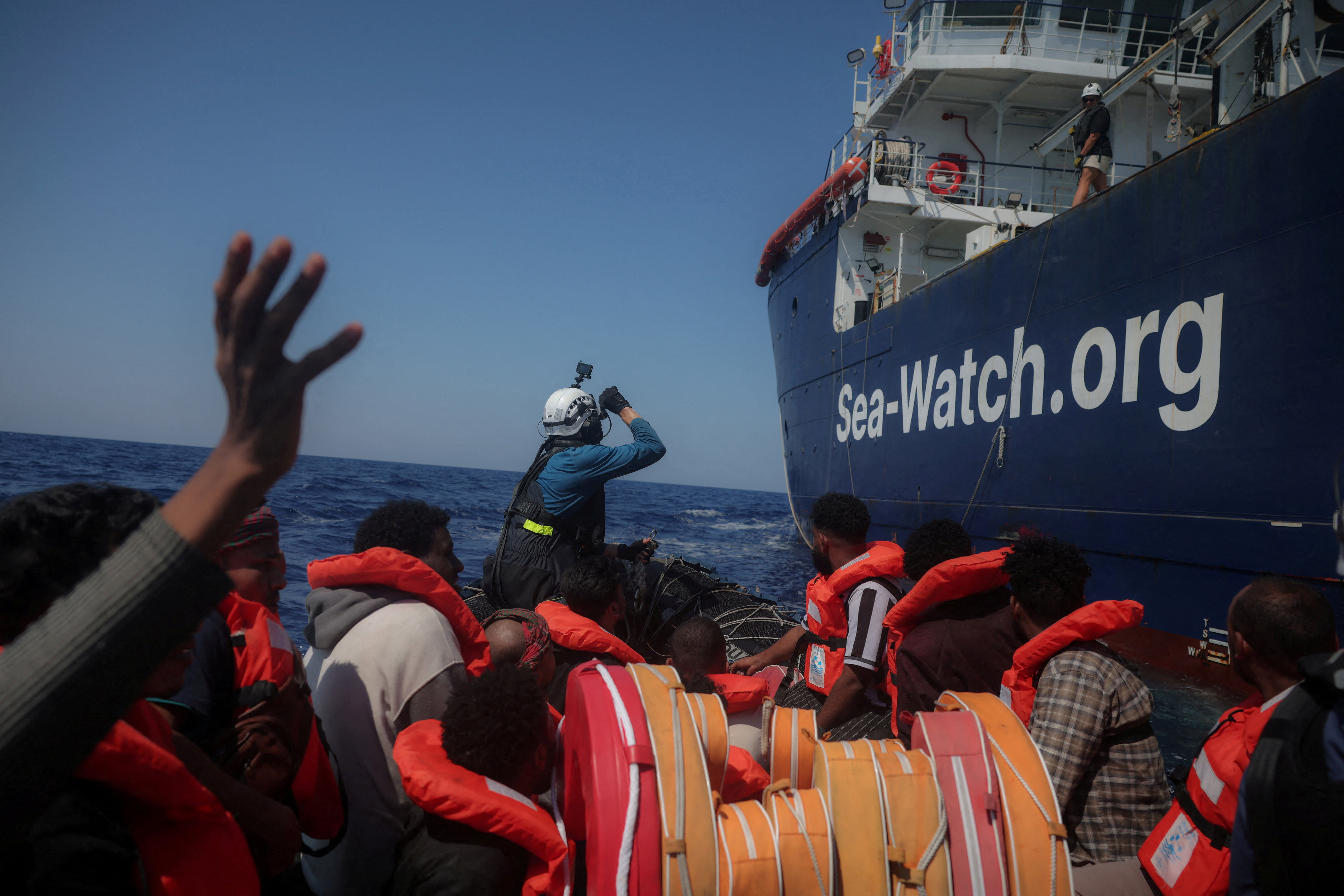 FILE PHOTO: German NGO Sea-Watch carries out a rescue operation for migrants aboard an overcrowded boat in the Mediterranean off Libya, August 11, 2025.   (photo credit:  REUTERS/Louisa Gouliamaki/File Photo)