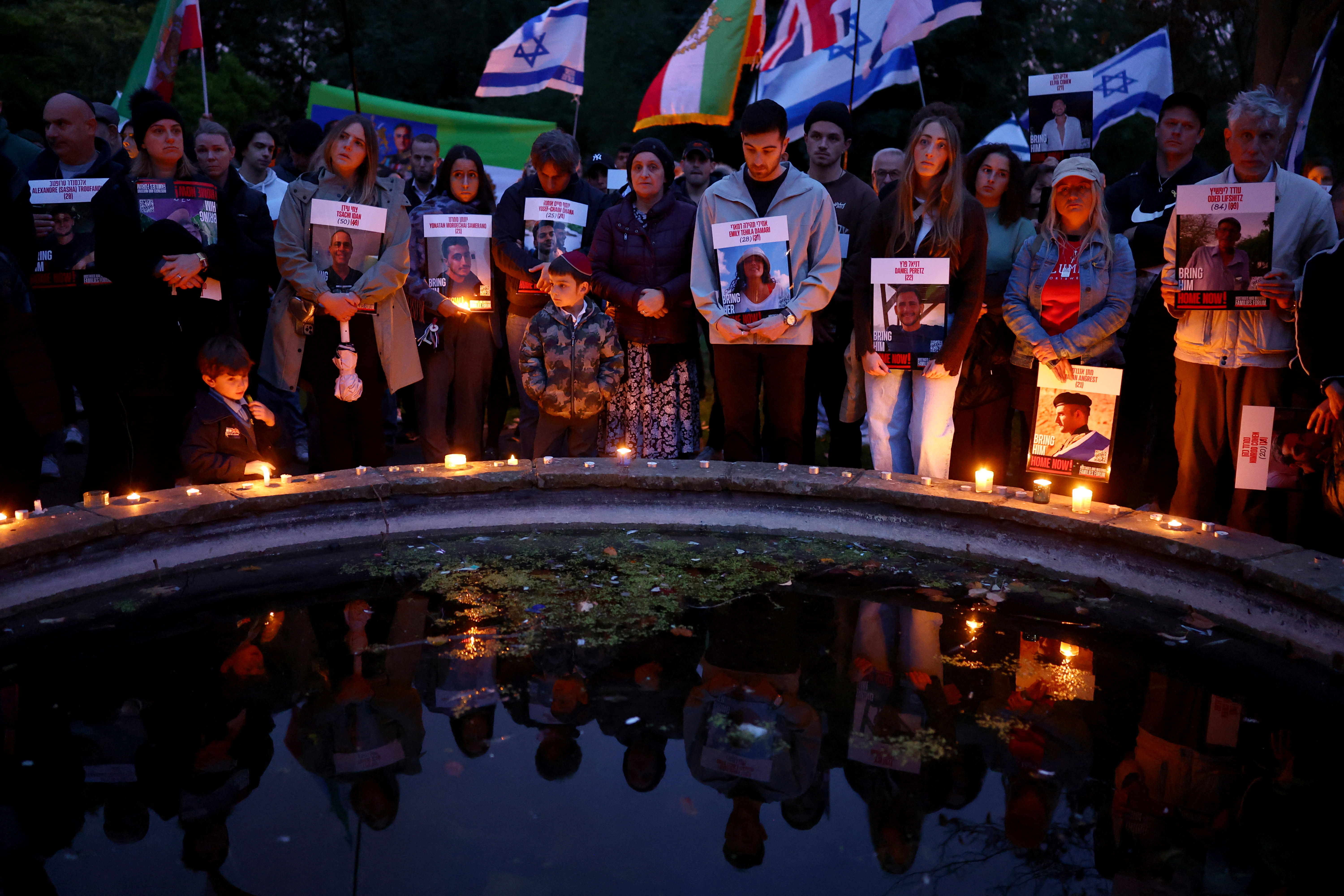 MEMBERS OF the Hostages and Missing Families Forum hold a vigil in London for the one-year anniversary of the October 7 massacre, on October 7, 2024, (photo credit: Hannah McKay/Reuters)