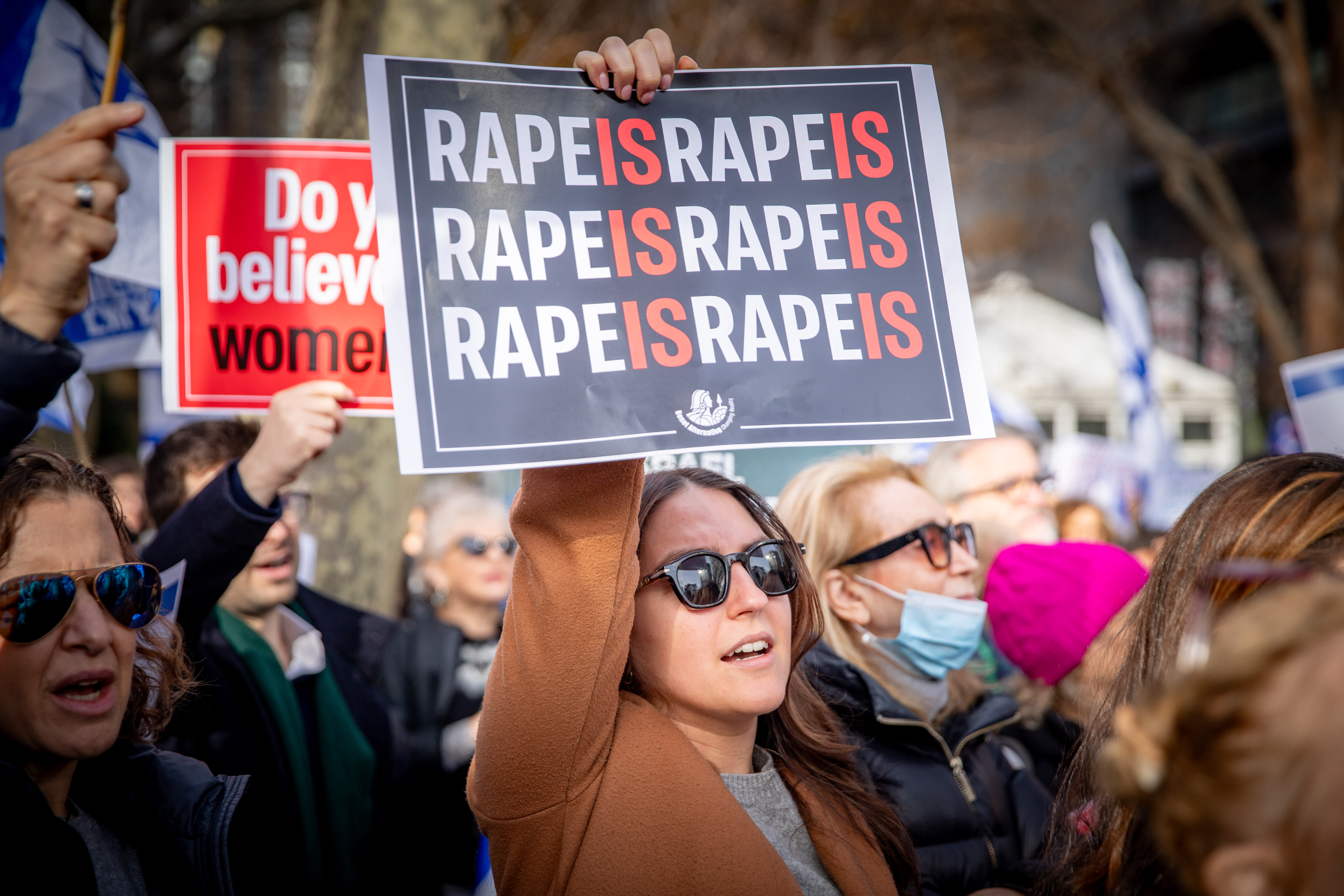 Demonstrators gather during a protest the crimes and sexual violence against women in October 7 massacre, outside of United Nations headquarters in New York City, on December 4, 2023. (photo credit: Yakov Binyamin/Flash90)