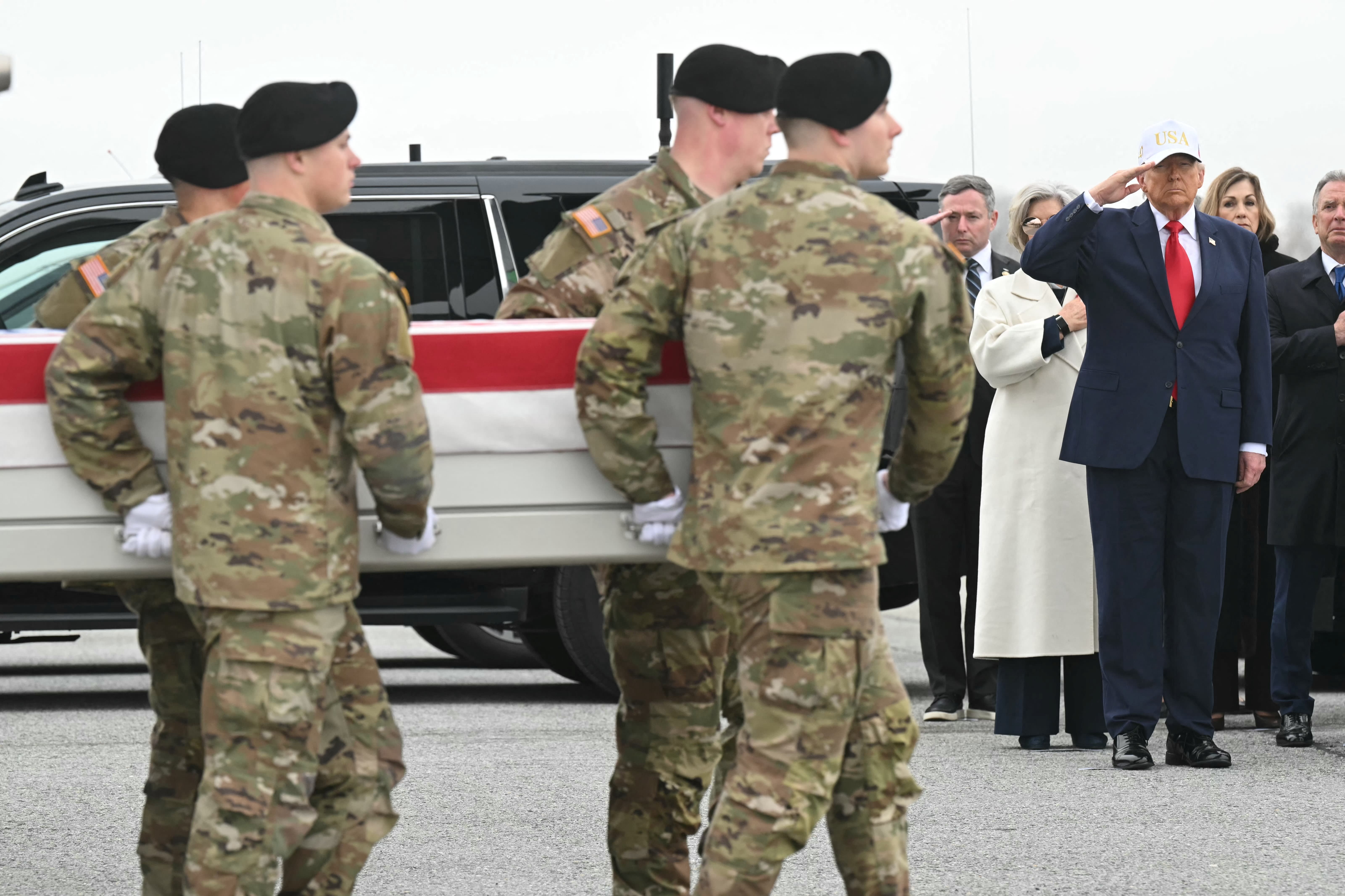 Members of a US Army team carry a flagged-drapped transfer case containing the remains of US soldier Capt. Cody A. Khork during a dignified transfer solemn event at Dover Air Force Base, in Dover, Delaware, on March 7, 2026. (photo credit: SAUL LOEB / AFP via Getty Images)