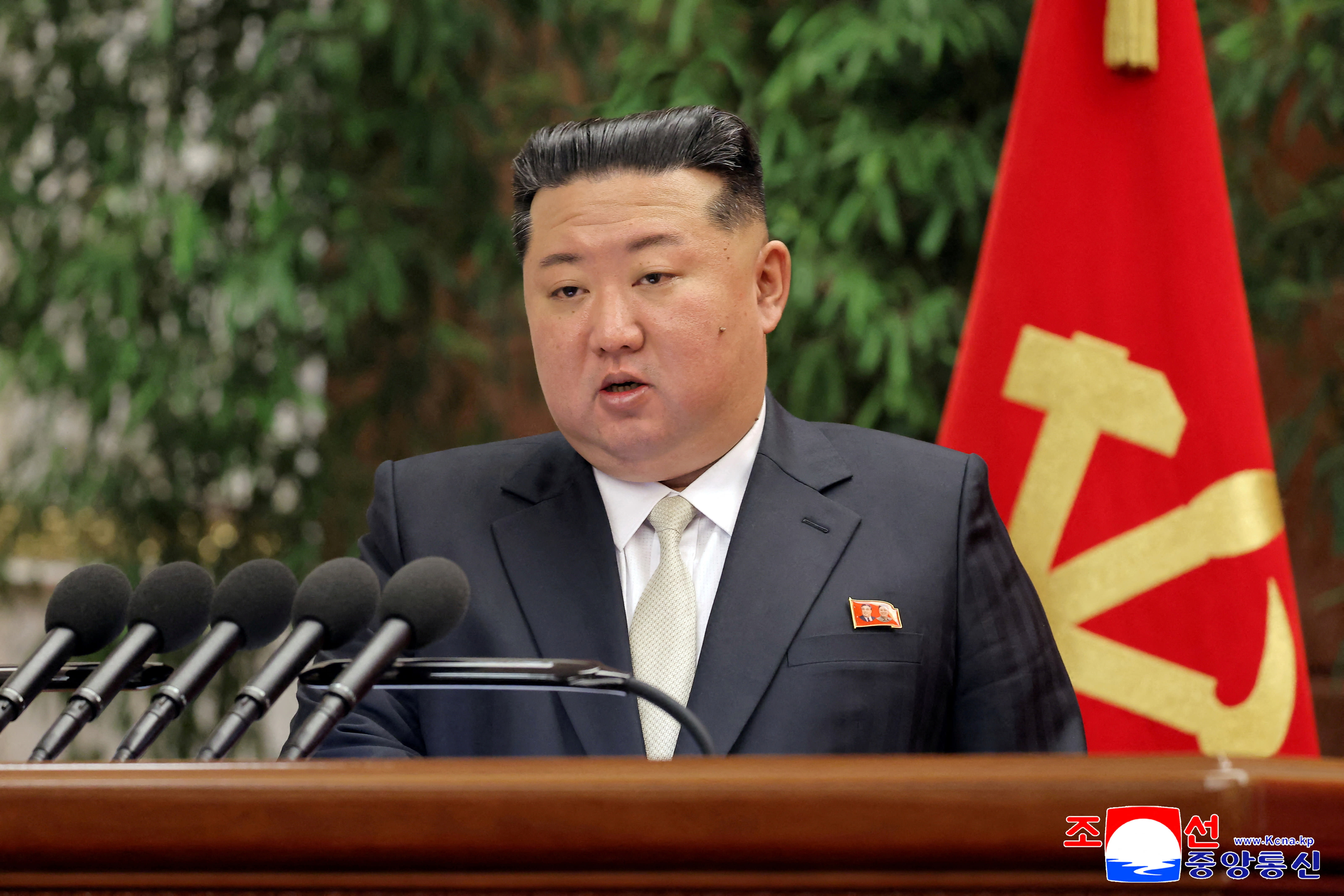  North Korean leader Kim Jong Un speaks during the expanded meeting of the first plenary meeting of the Ninth Central Committee of the Workers