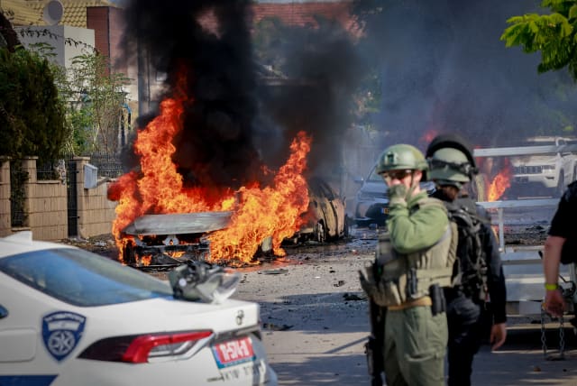  The scene where a rocket fired from Gaza into Southern Israel, hit and caused damaged in the southern Israeli city of Ashkelon. October 7, 2023 (photo credit: YOSSI ZAMIR/FLASH90)