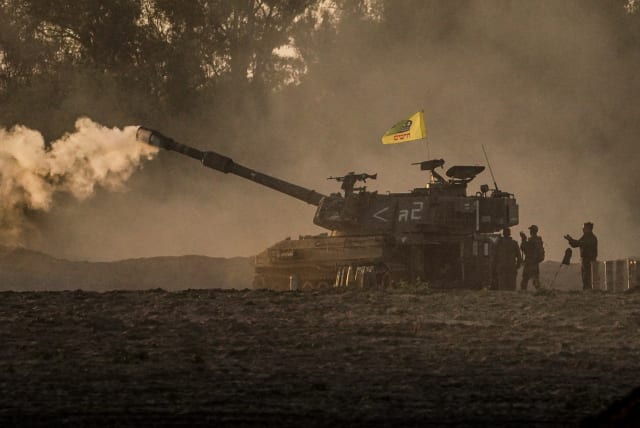  Israeli artillery unit firing shells towards the Gaza Strip, in southern Israel, December 19 (photo credit: FLASH90)