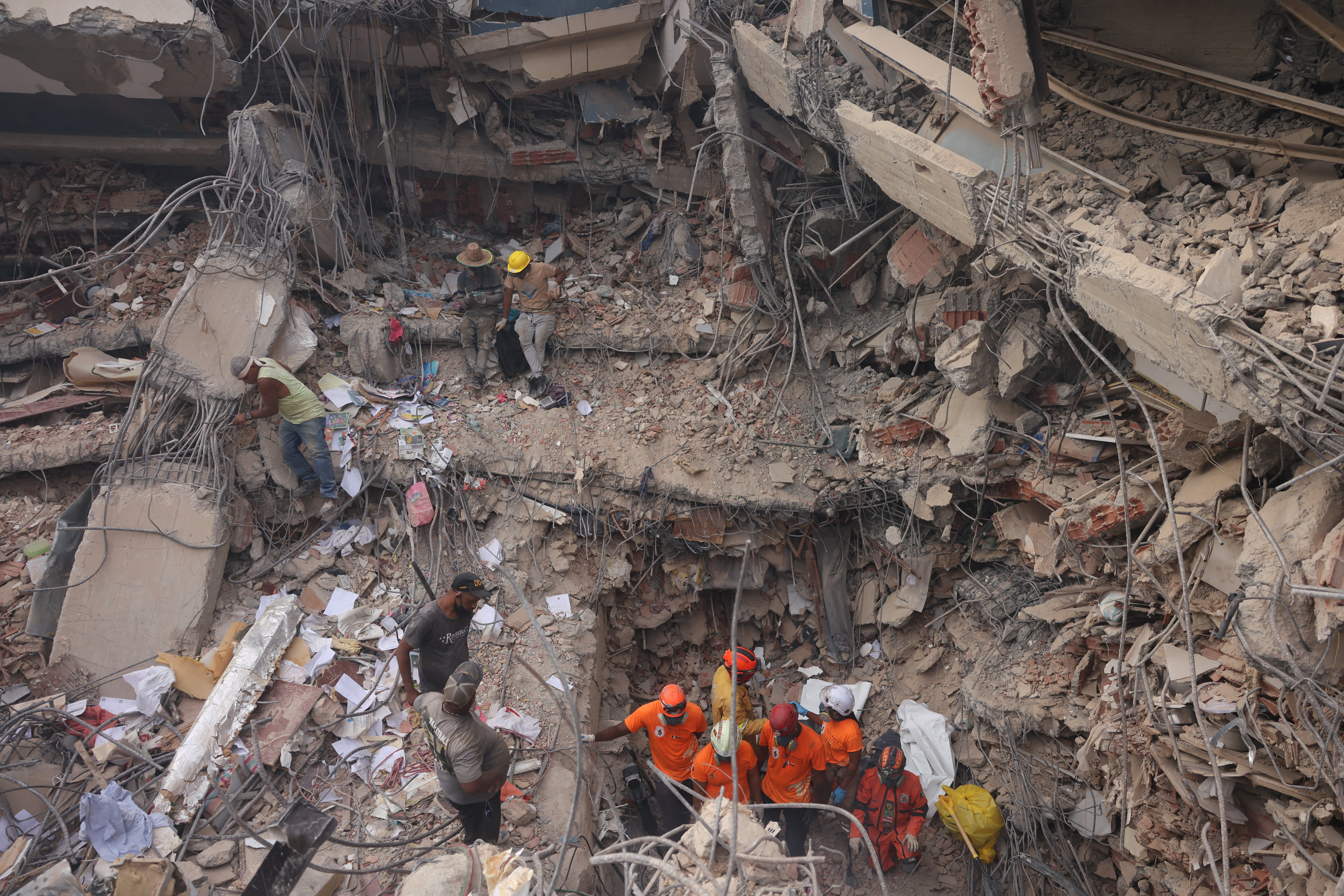 Rescuers search through debris, in the aftermath of the June 24 earthquakes in Caraballeda, La Guaira state, Venezuela, July 9, 2026. (photo credit: Leonardo Fernandez Viloria/Reuters)