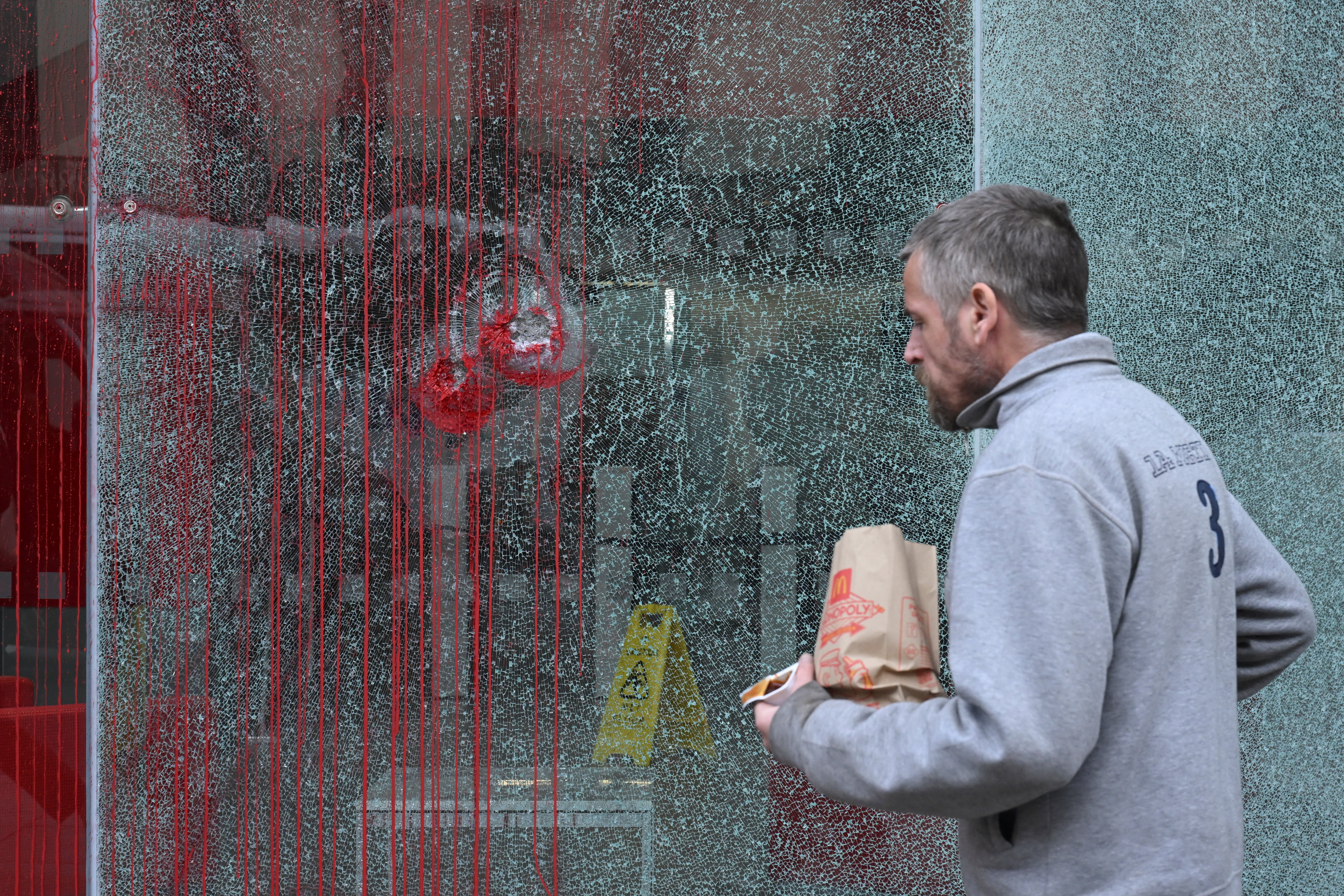 A man walks past a smashed window on the office building of Bain & Company after it was vandalised by pro-Palestine protesters during a demonstration over alleged ties to Israeli drone manufacturer Elbit Systems in London, Britain, September 16, 2025. (photo credit: JAIMI JOY/REUTERS) A man walks past a smashed window on the office building of Bain & Company after it was vandalised by pro-Palestine protesters during a demonstration over alleged ties to Israeli drone manufacturer Elbit Systems in London, Britain, September 16, 2025. (photo credit: JAIMI JOY/REUTERS)