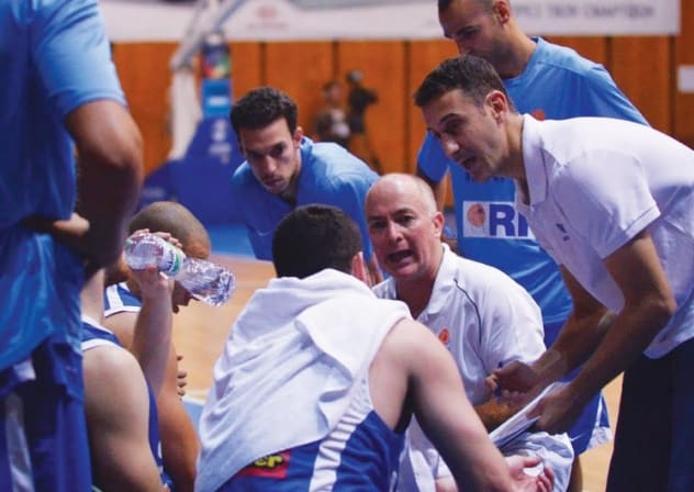 Israel coach Erez Edelstein (center) has guided the national team to first place in EuroBasket qualifying Group B after three games, but he knows nothing has been decided yet with three teams tied at 2-1 at the midway point of the campaign.