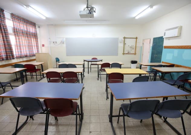 An empty classroom (illustrative).