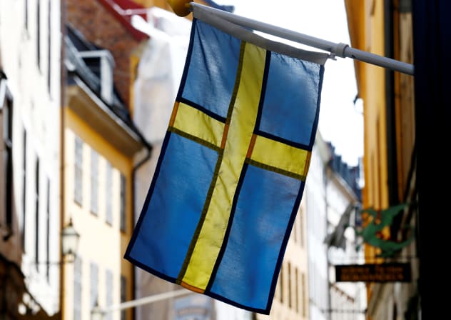 The Swedish flag is seen at Gamla Stan, the Old City of Stockholm, Sweden, May 7, 2017.