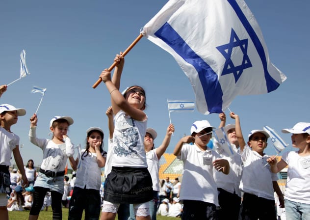 Preschool children from the southern city of Ashkelon, celebrating with the Israeli flag, on 18 April, 2010 the Independence Day.
