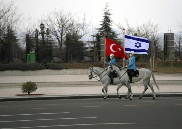 The flags of Turkey and Israel are flown as President Isaac Herzog makes a state visit to Turkey, March 9, 2022.