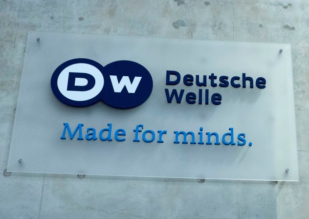 The Deutsche Welle logo is seen on the foyer of the German broadcaster's Berlin location, March 2, 2022.