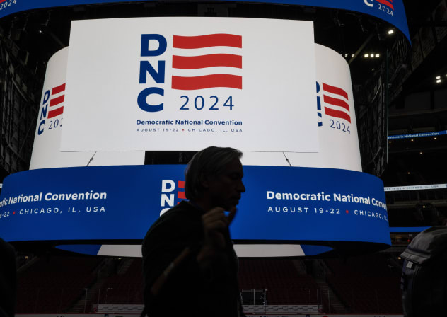  The logo for the Democratic National Convention is displayed on the scoreboard at the United Center during a media walkthrough in Chicago, Jan. 18, 2024.