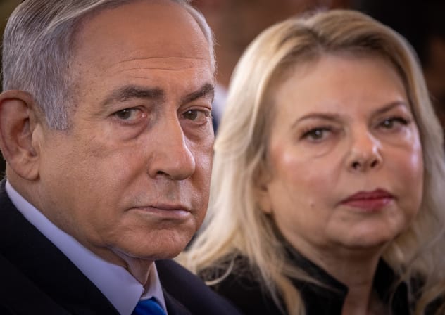  Prime Minister Benjamin Netanyahu and his wife Sara at a state ceremony marking the Hebrew calendar anniversary of the Hamas attack on October 7 of last year which sparked the ongoing war in Gaza, at Mount Herzl military cemetery in Jerusalem on October 27, 2024.