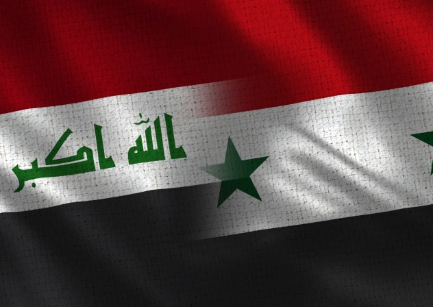  An illustrative image of the Syrian and Iraqi flags.