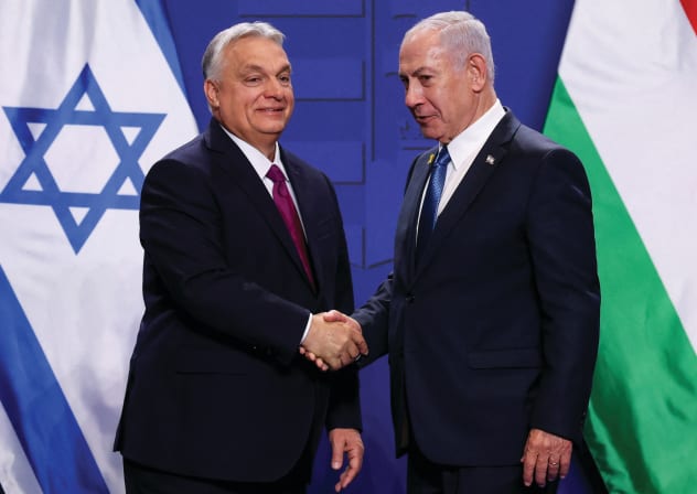  Prime Minister Benjamin Netanyahu and Hungarian Prime Minister Viktor Orban shake hands in Budapest in April 2025.