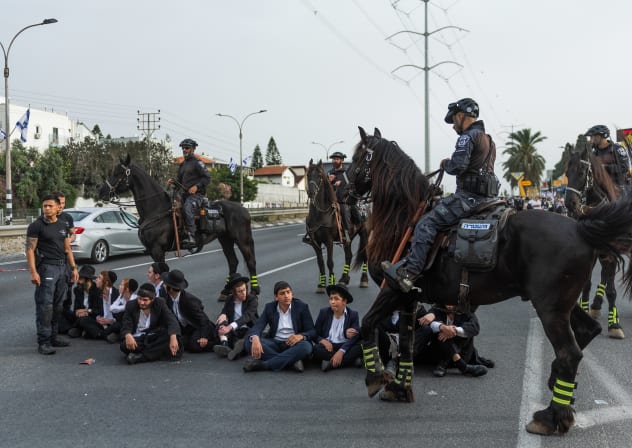  Haredim protest against the IDF draft on Highway 4 outside Bnei Brak; illustrative, April 6, 2025.