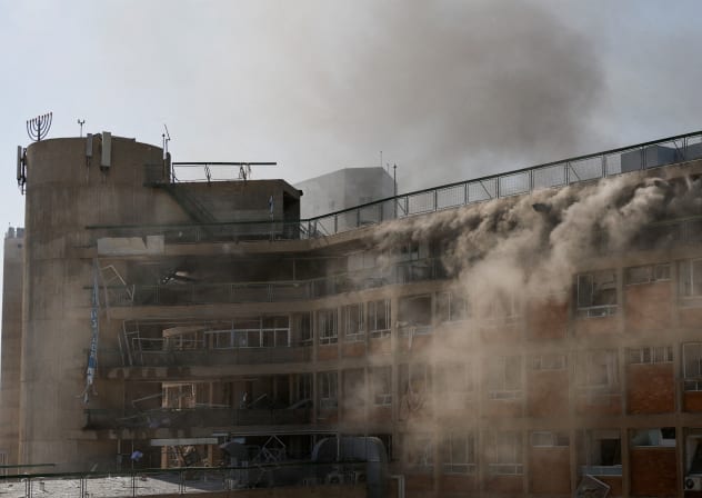  Smoke rises from Soroka Medical Center, the city's general hospital, following a missile strike from Iran on Israel, in Beersheba, Israel June 19, 2025