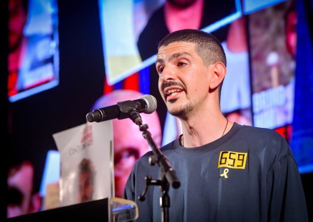 Former hostage Or Levy speaks during a rally calling for the release of Israelis held hostage in Gaza, at Hostage's Square in Tel Aviv, July 26, 2025