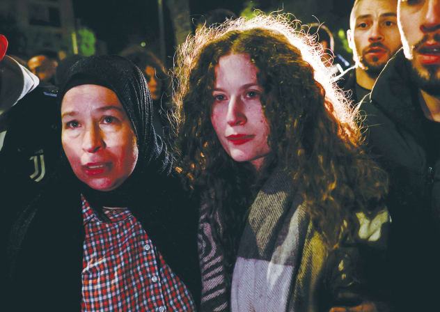 AHED TAMIMI, walking with her mother in Ramallah, is free after her release in a hostages-prisoners swap between Hamas and Israel in November 2023. ‘Palestinians are fighting Jews, not only Zionism,’ she declared.
