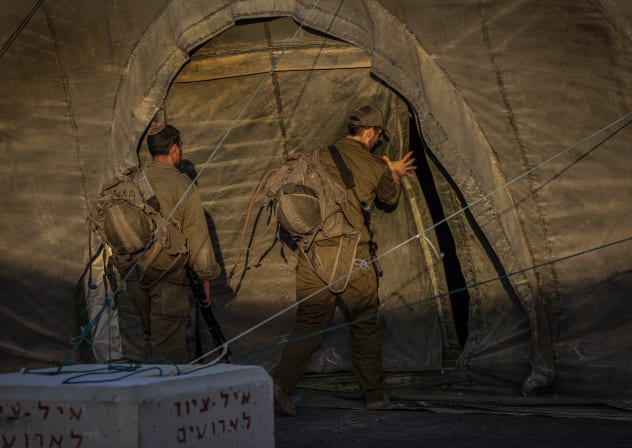 Israeli reserve soldiers arrive at their base ahead of the military’s entry into Gaza City, at a military base in southern Israel, September 2, 2025. 