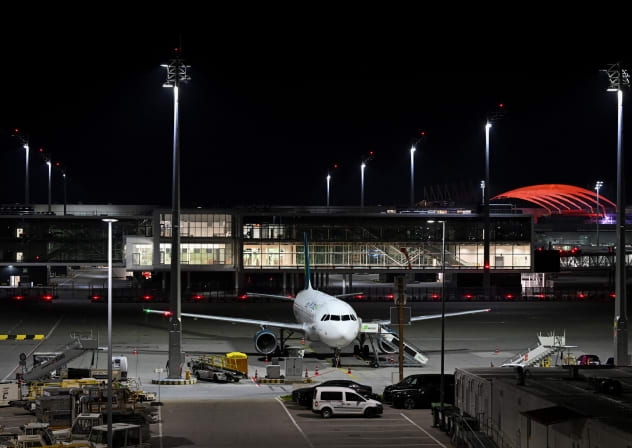 An airplane is parked at the airport in Munich, Germany, October 4, 2025, after both runways were closed on Friday evening for the second time in less than 24 hours, with the captain on an aircraft whose departure was canceled telling passengers that drones had once again been sighted