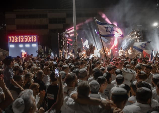 PEOPLE MARK the conclusion of Simchat Torah at Hostage Square in Tel Aviv last week, even as the clock continues to tick, still awaiting the return of hostages killed in captivity in Gaza. Simchat Torah was a mix of emotions this year, the writer notes. 