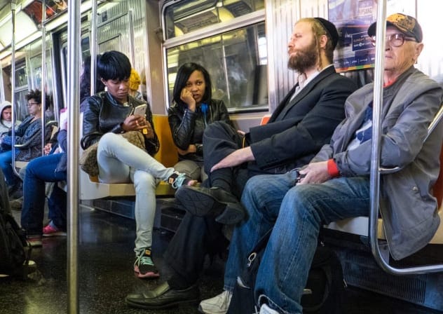 People traveling in a subway train in New York city, Oct. 26, 2015. 