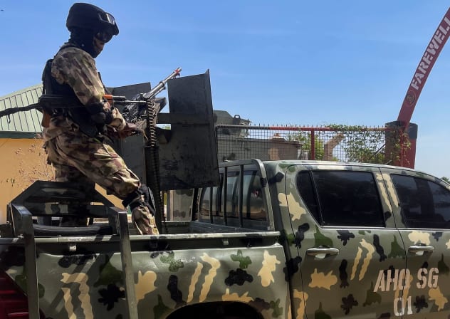ILLUSTRATIVE: A Nigerian soldier stands on a military truck, during the tour of the Theatre Command Operation Lafiya Dole by Nigeria's Chief of Army Staff, at the Maimalari Cantonment in Maiduguri, Borno, Nigeria, November 7, 2025