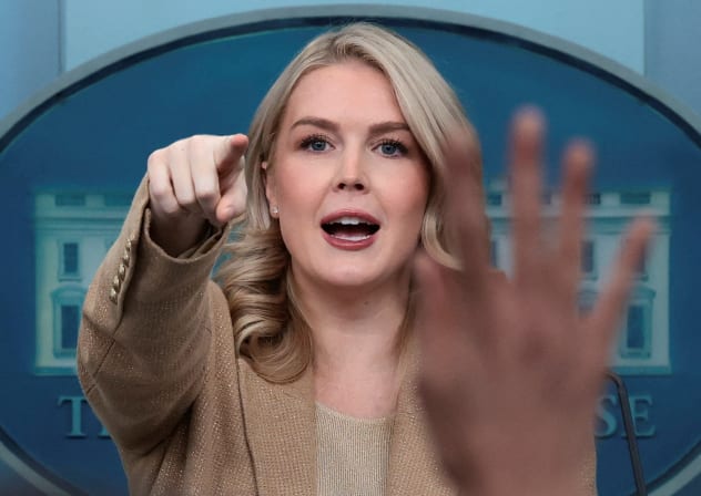 White House Press Secretary Karoline Leavitt points while she holds a press briefing at the White House, in Washington, DC, US, December 1, 2025.
